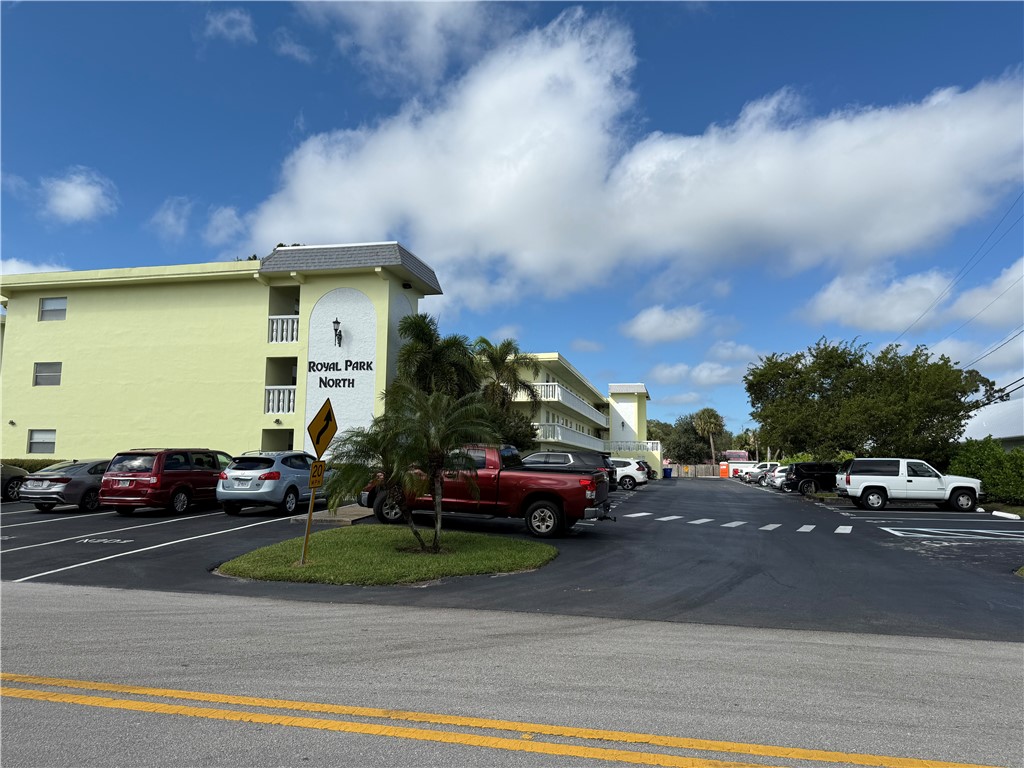 1100 Ponce De Leon Circle, Unit N208 Vero Beach, FL 32960 - Photo 4 of 16 a car parked on the side of the road