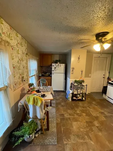 a room with furniture and a chandelier