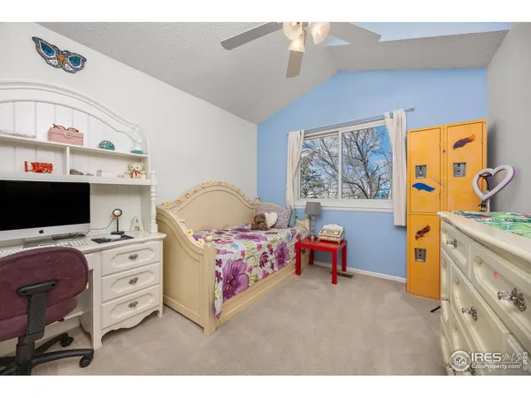 a room with lots of furniture and clutter