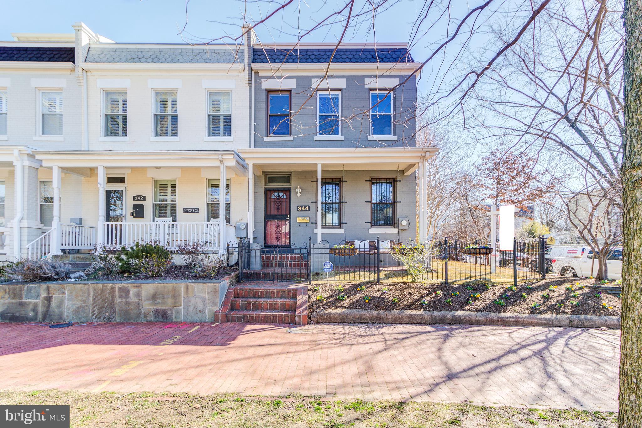 344 14th Street Southeast Washington, DC 20003 - Photo 1 of 31 a view of a building with a bench in a patio