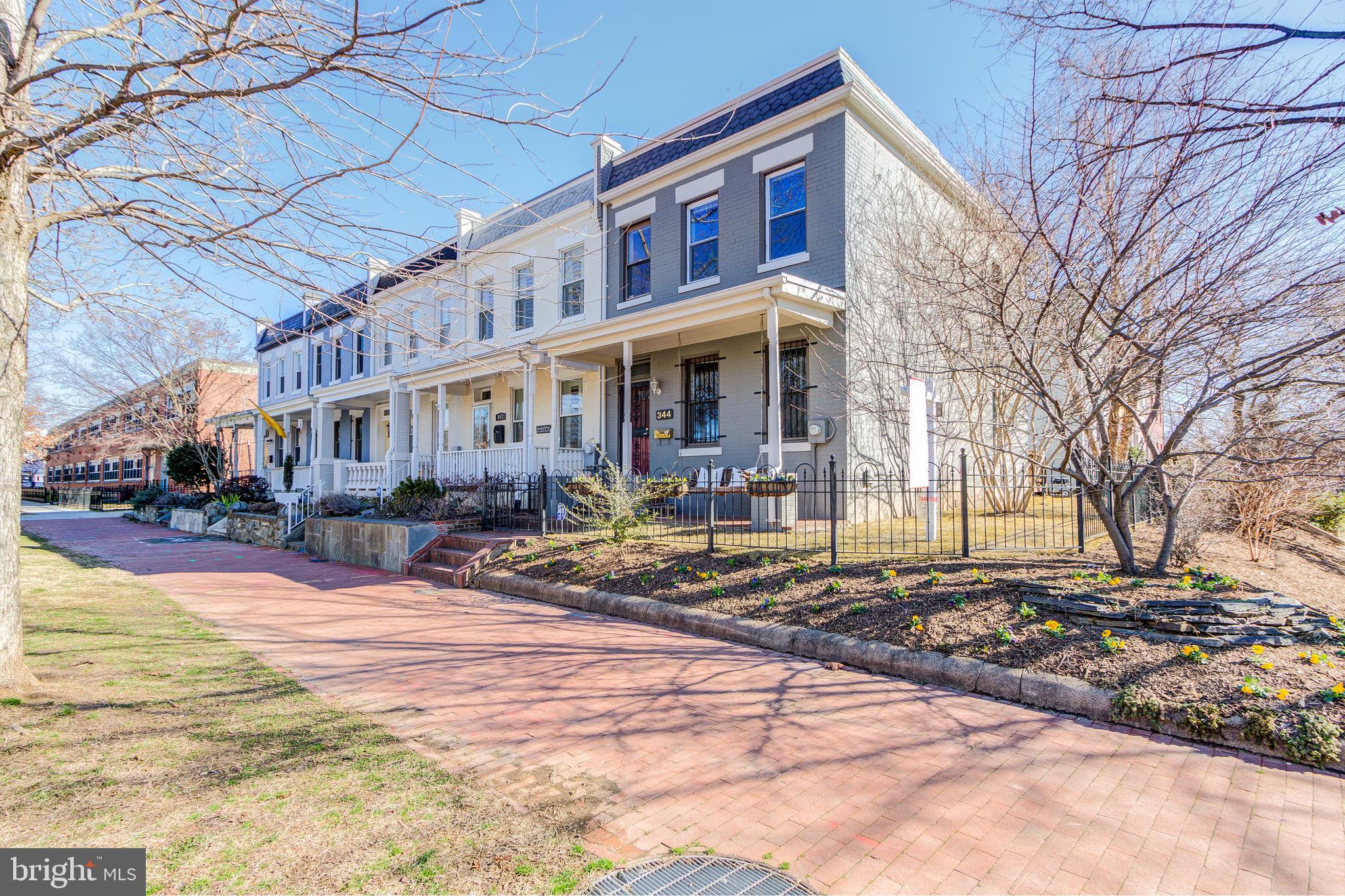 344 14th Street Southeast Washington, DC 20003 - Photo 2 of 31 a view of a brick building with many windows