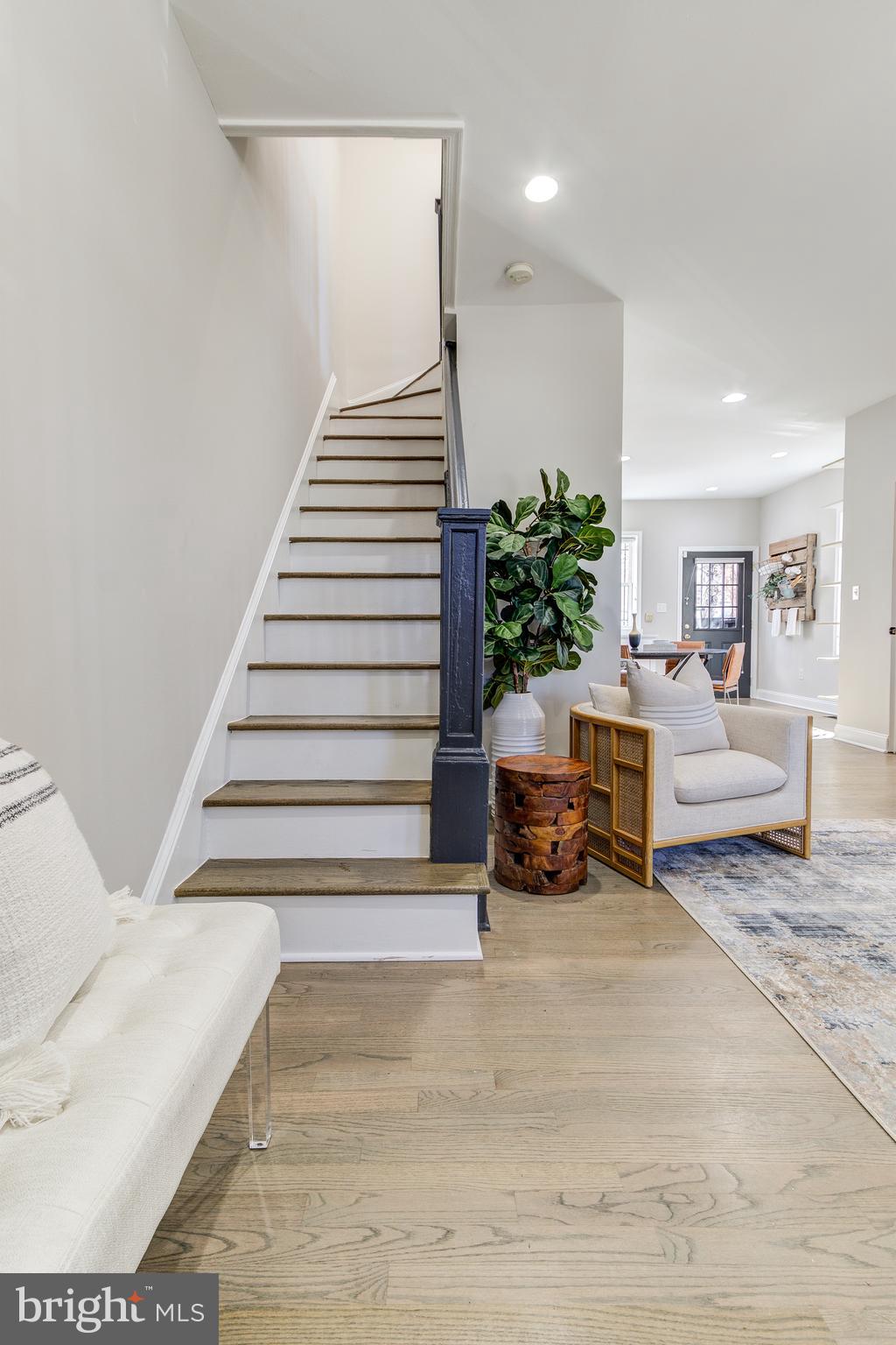 344 14th Street Southeast Washington, DC 20003 - Photo 17 of 31 a living room with furniture and a white bench
