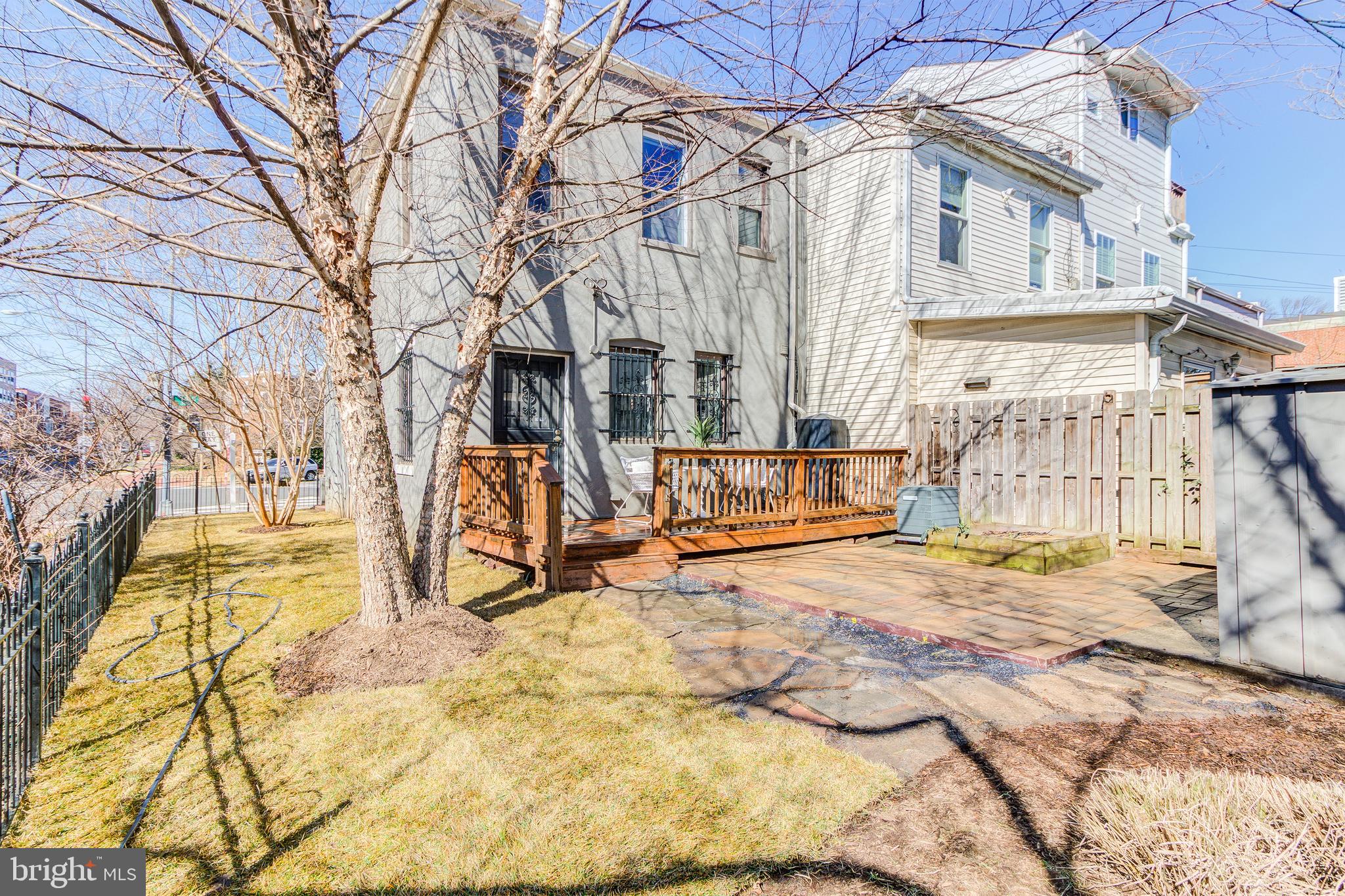 344 14th Street Southeast Washington, DC 20003 - Photo 27 of 31 a view of a house with snow on the background