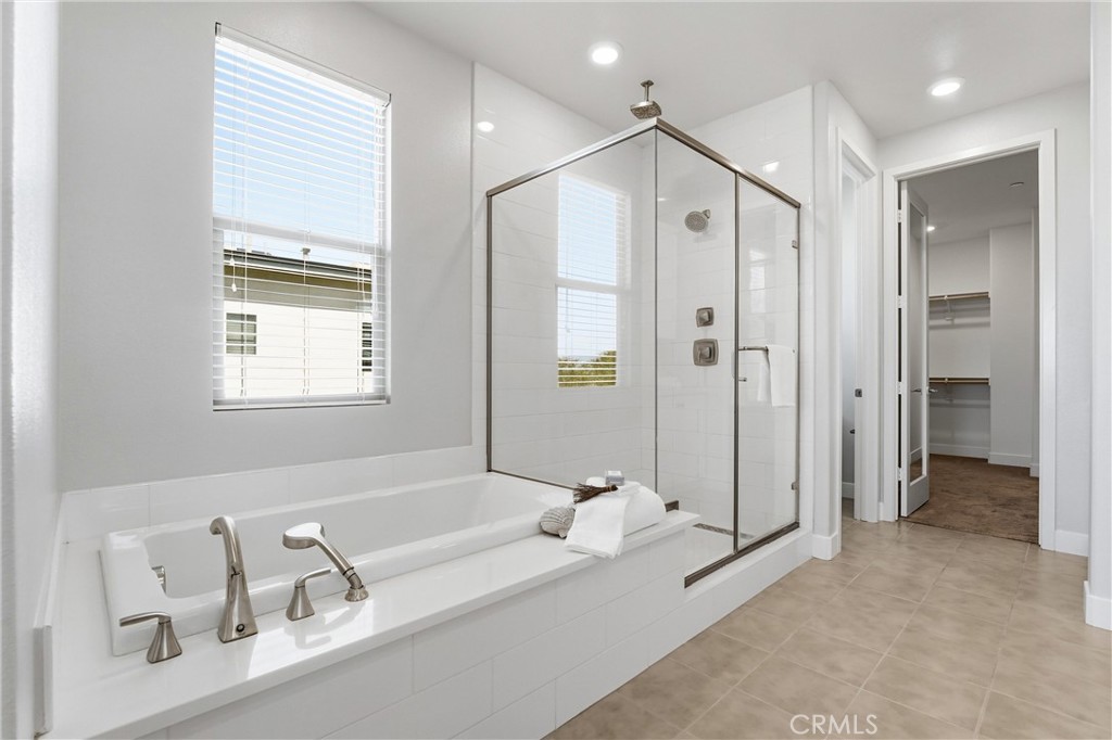 182 Scale Irvine, CA 92618 - Photo 32 of 61 Soaking tub. Separate walk in shower with a rain head. Natural light. Nothing more needs to be said.