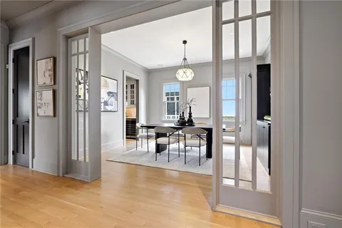 a view of a livingroom with a dinning area hardwood floor and a living room