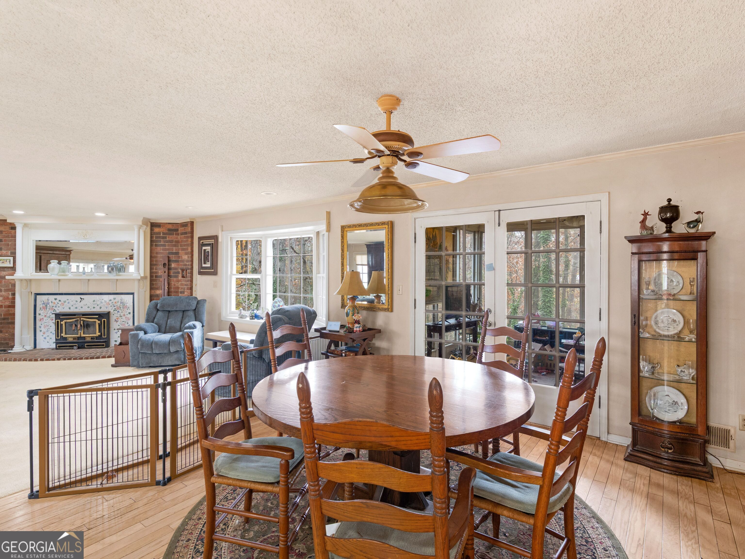 879 Rocky Creek Road Hampton, GA 30228 - Photo 11 of 29 a dining room with furniture window and wooden floor