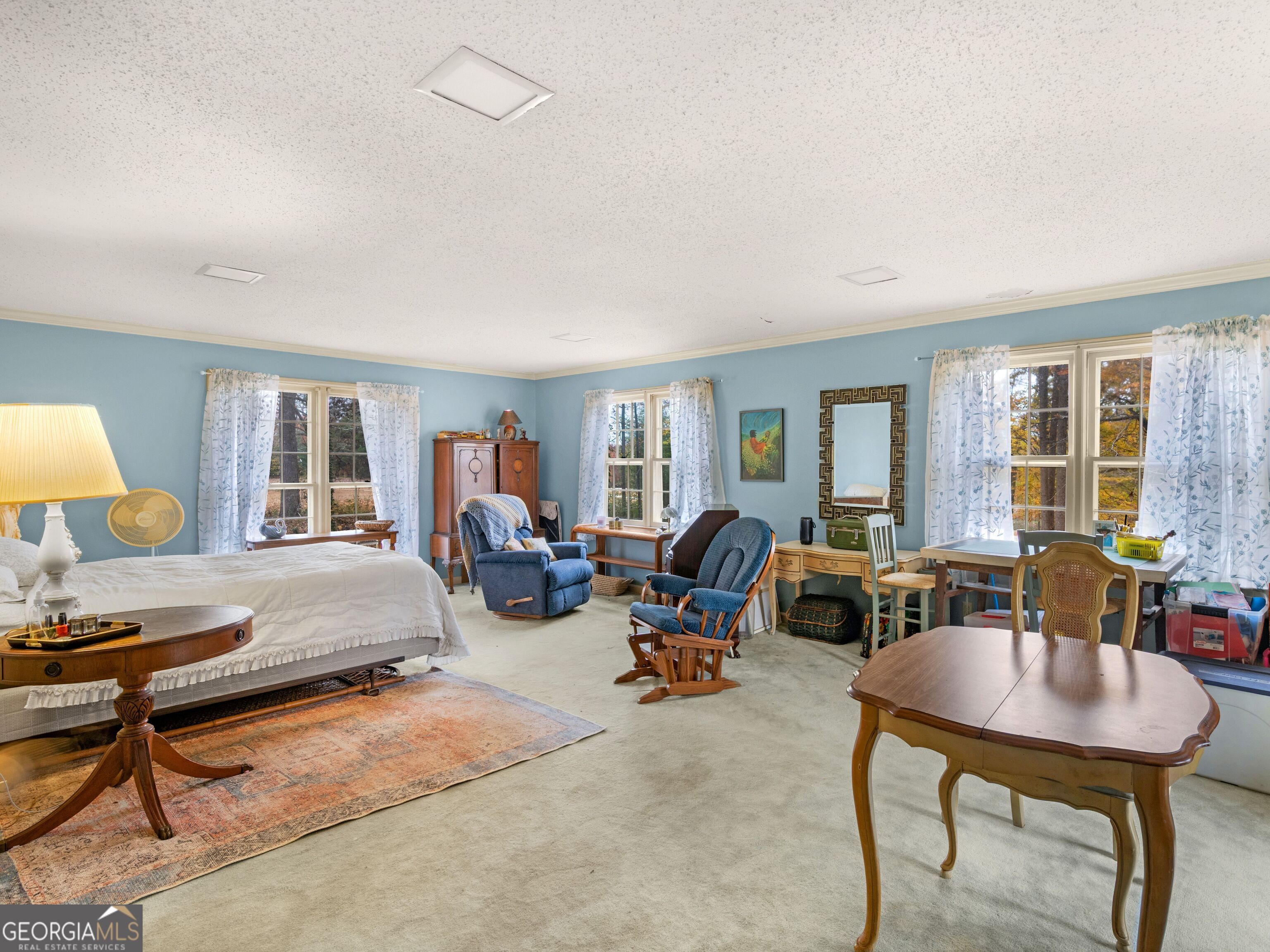 879 Rocky Creek Road Hampton, GA 30228 - Photo 20 of 29 a living room with furniture fireplace and window