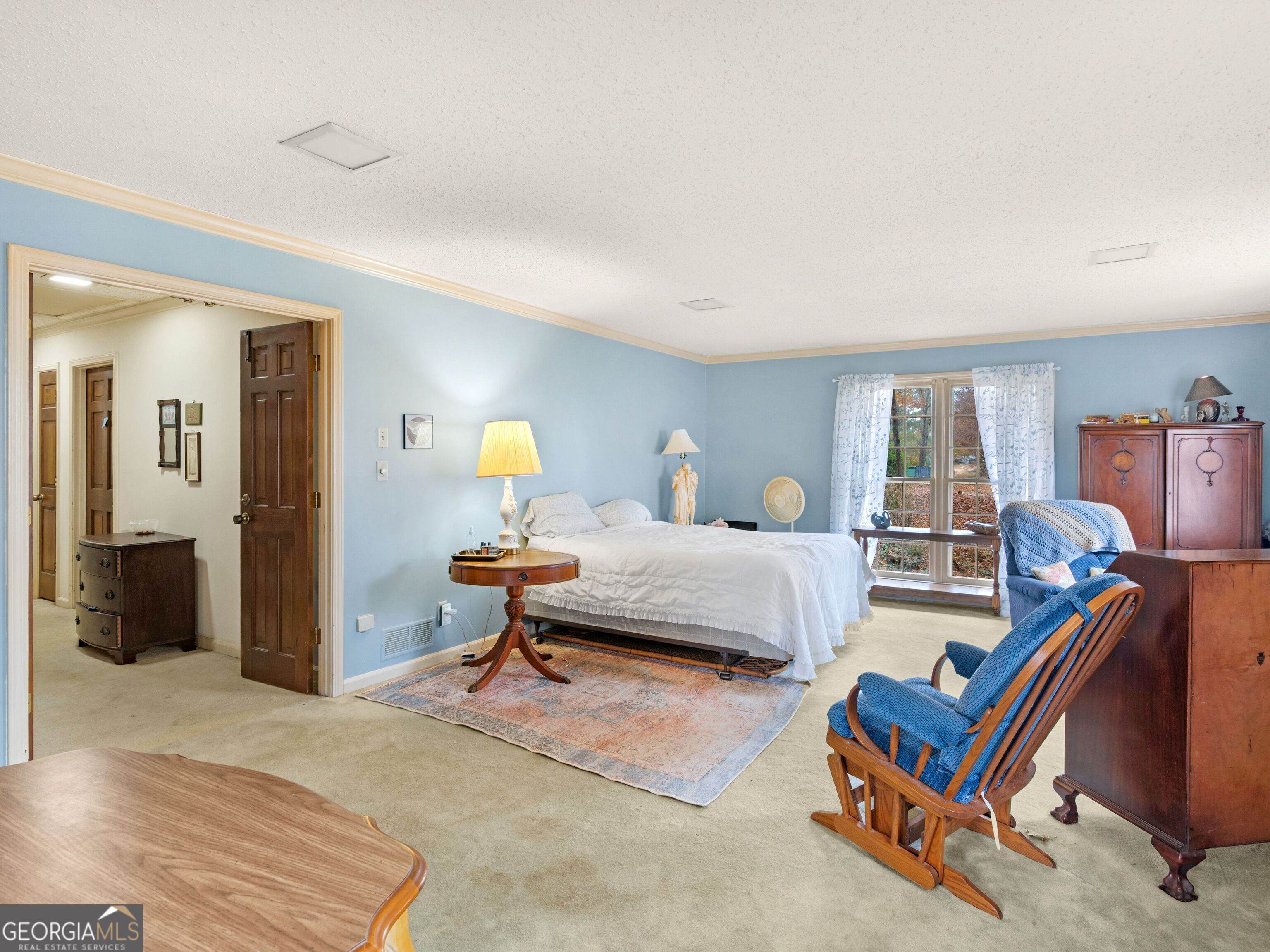 879 Rocky Creek Road Hampton, GA 30228 - Photo 21 of 29 a bedroom with two beds and painted walls