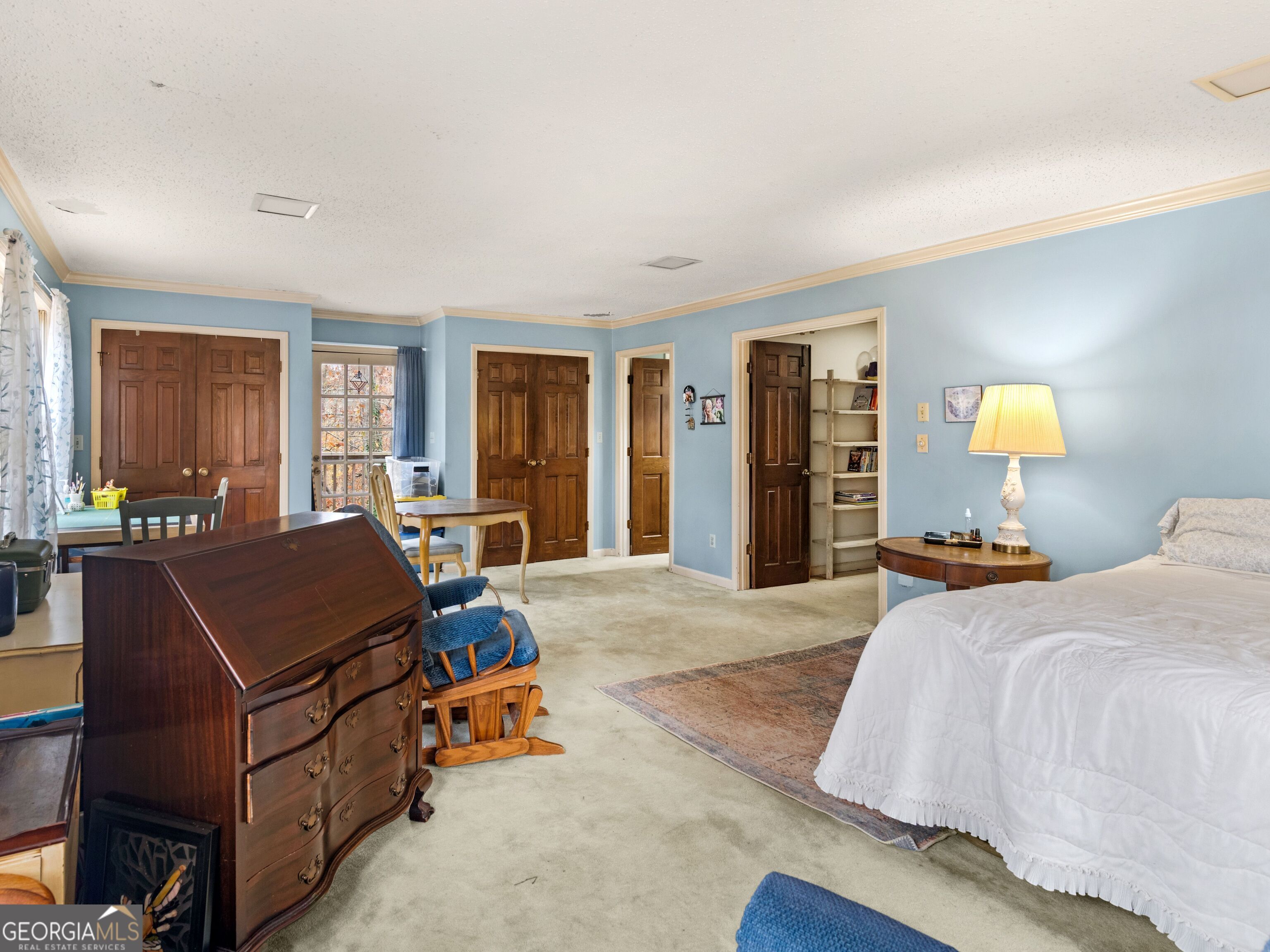 879 Rocky Creek Road Hampton, GA 30228 - Photo 22 of 29 a bedroom with bed and window