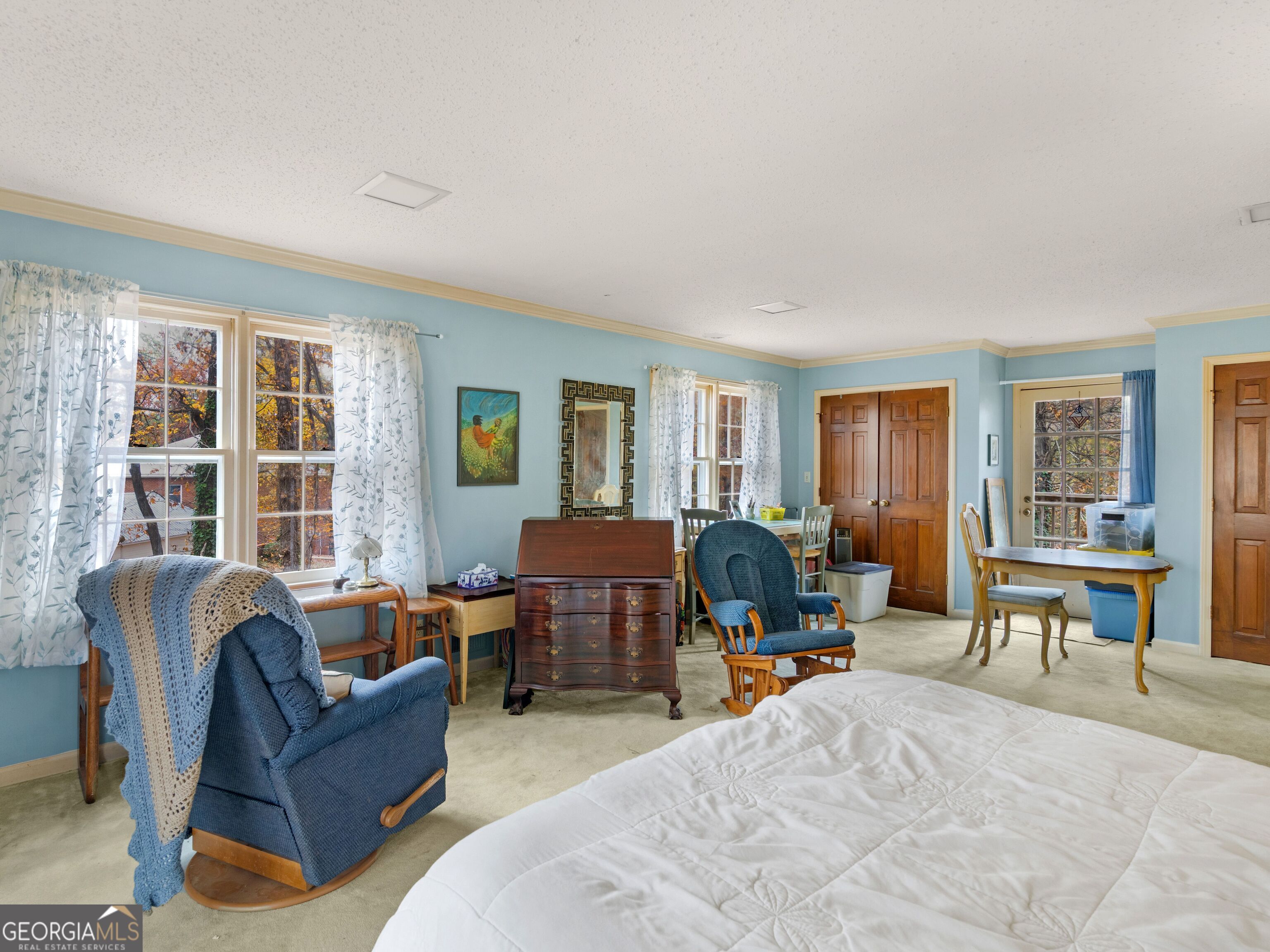 879 Rocky Creek Road Hampton, GA 30228 - Photo 23 of 29 a living room with furniture and a window