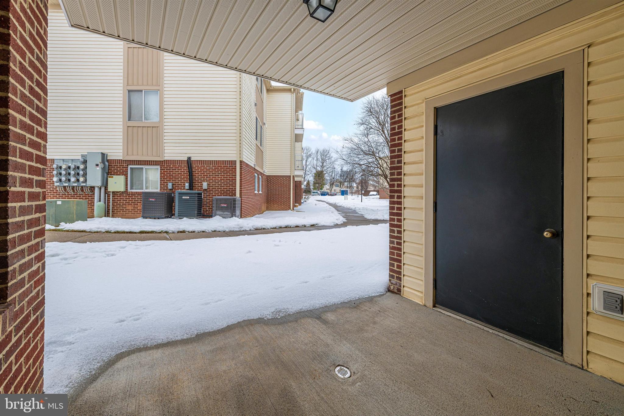 2100 Whitehall Road, Unit BC Frederick, MD 21702 - Photo 31 of 33 Private covered patio overlooks the common area