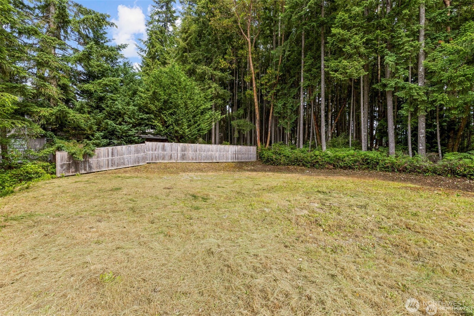 0 Northwest Misty Ridge Lane Silverdale, WA 98383 - Photo 15 of 16 a view of a backyard with large trees