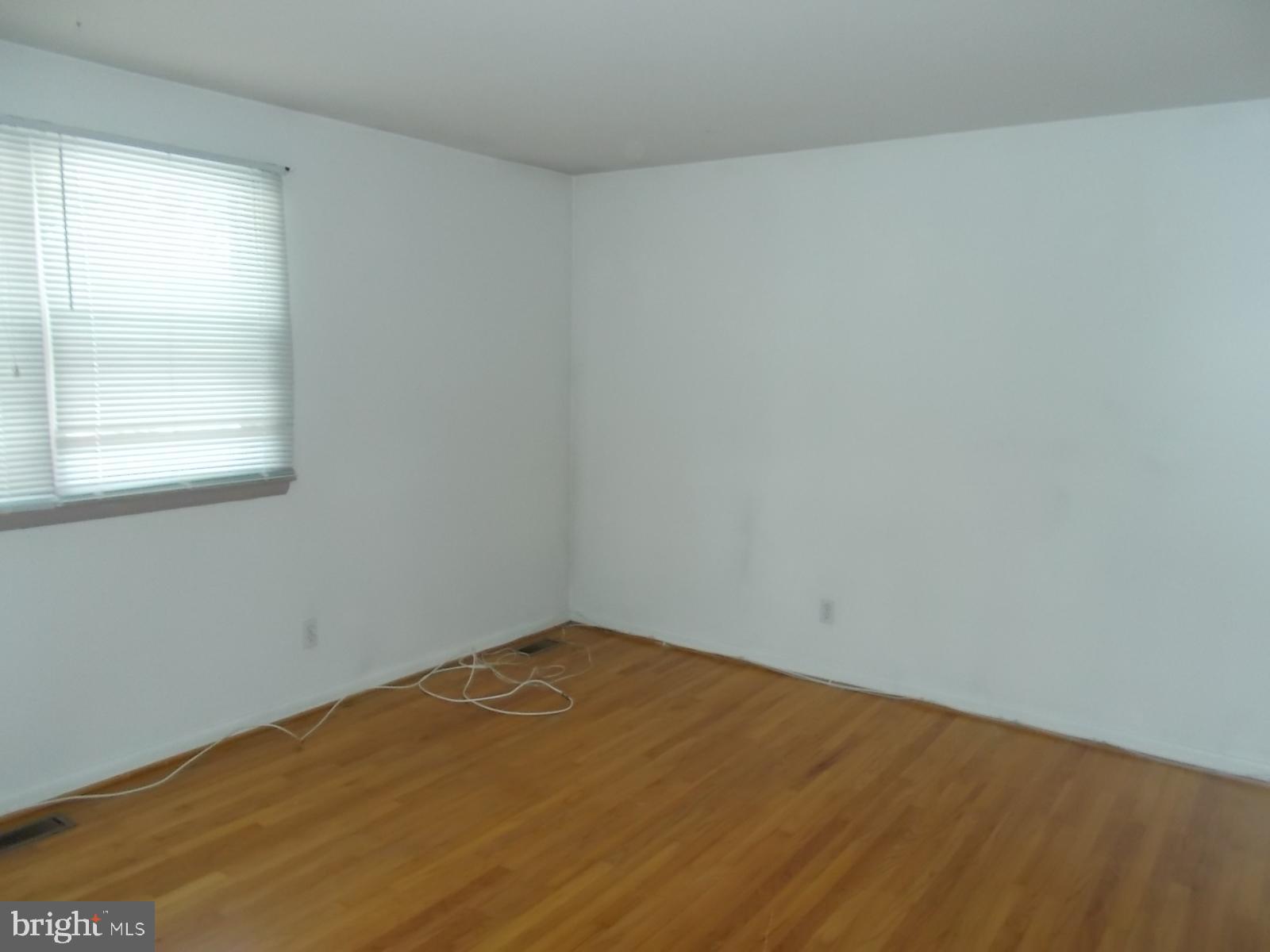 1317 Turret Road Bel Air, MD 21015 - Photo 7 of 14 an empty room with a window
