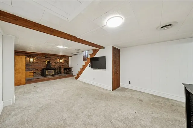 a view of a livingroom with car parked