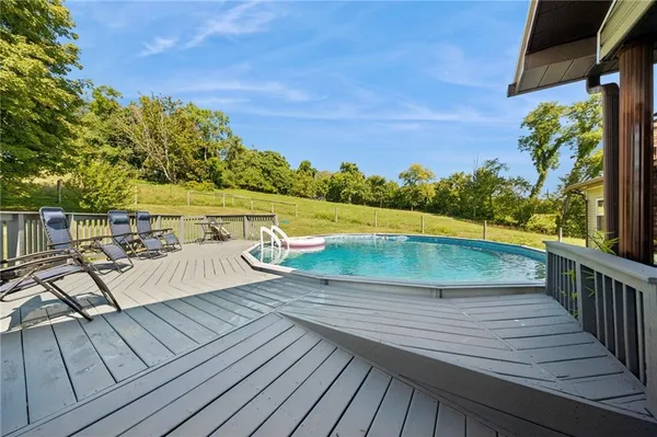 a view of outdoor space with lounge chair