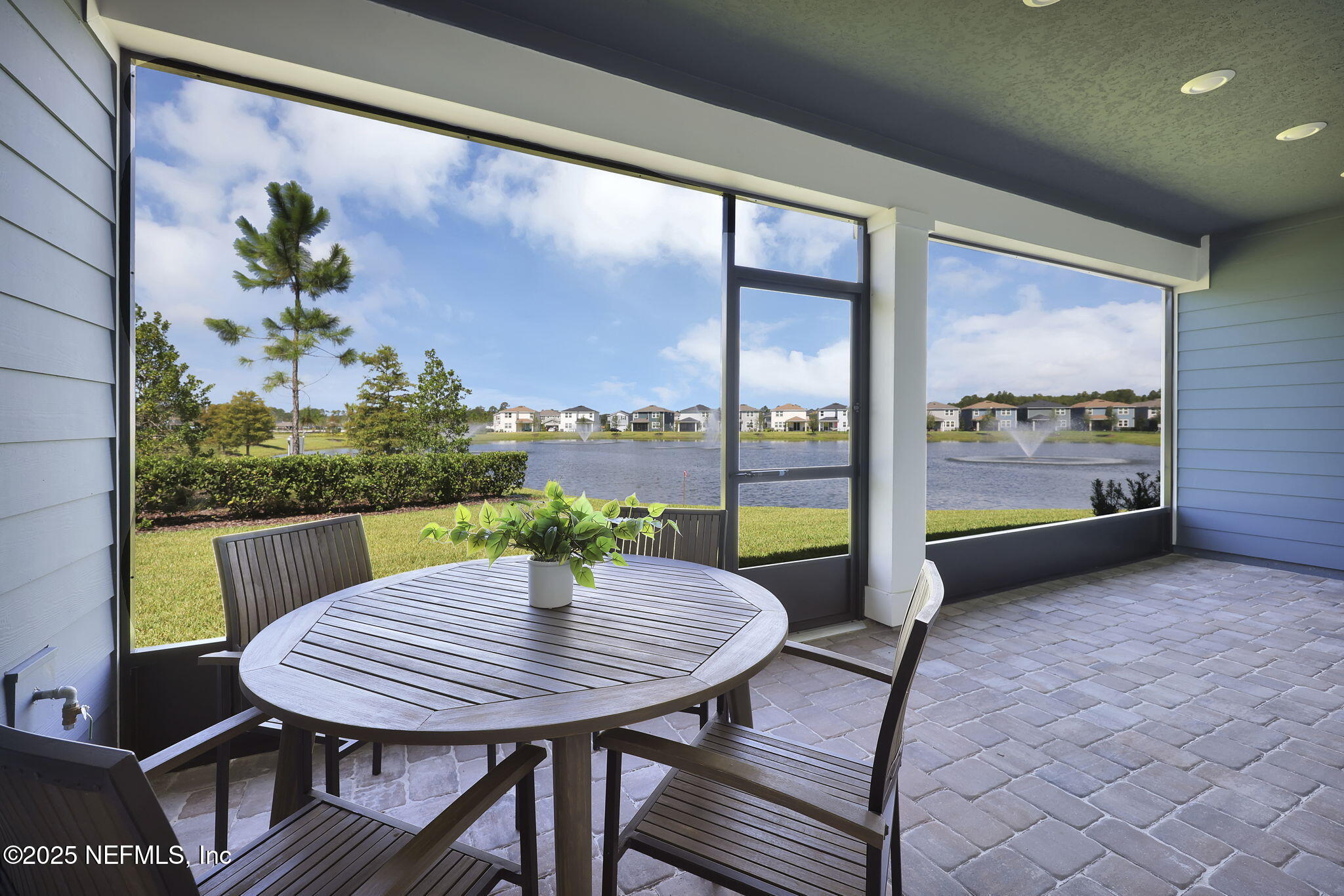 168 Coordinate Lane St. Johns, FL 32259 - Photo 16 of 22 a view of a balcony with a table and chairs