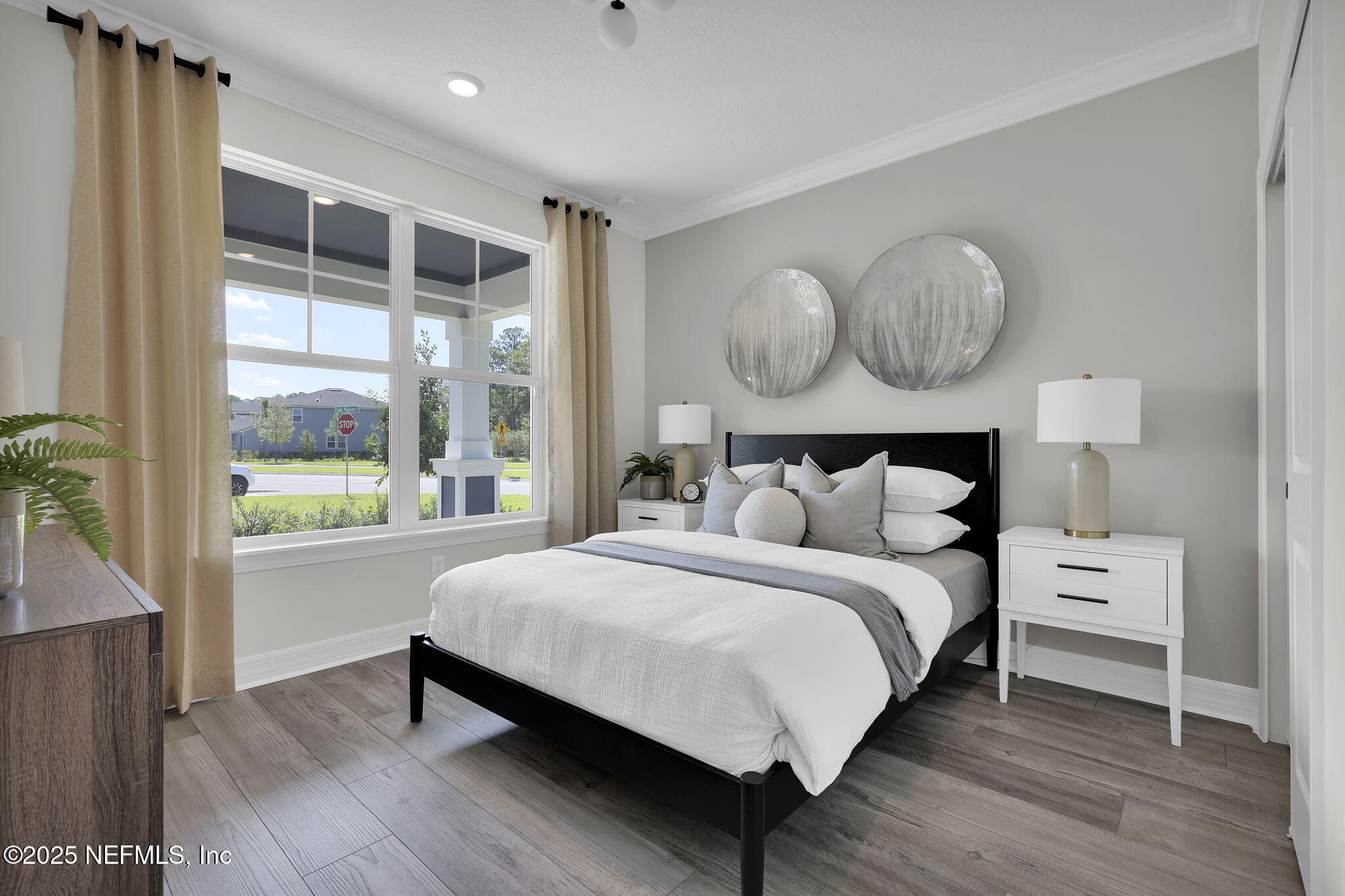 168 Coordinate Lane St. Johns, FL 32259 - Photo 18 of 22 a large bedroom with a bed and wooden floor