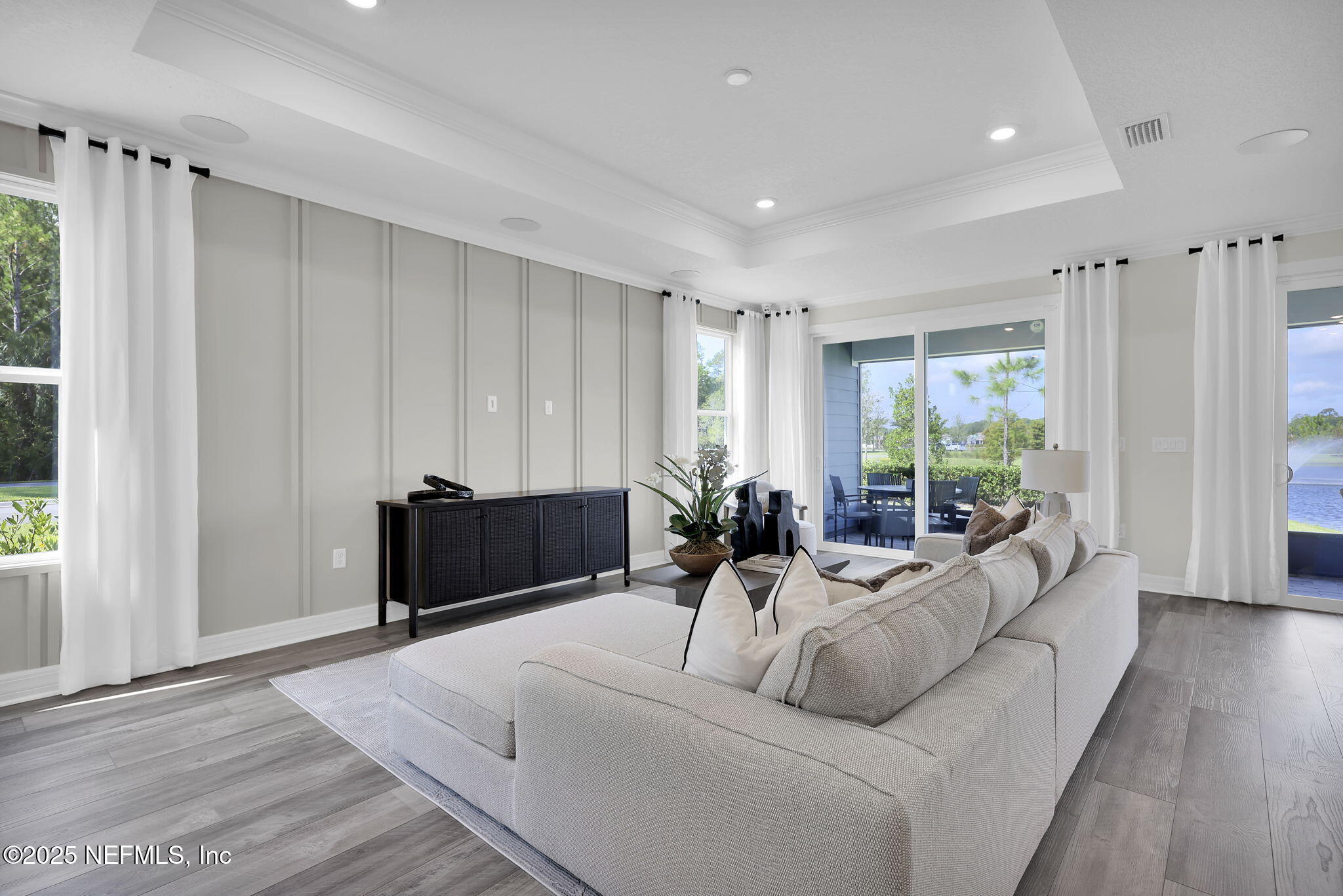 168 Coordinate Lane St. Johns, FL 32259 - Photo 9 of 22 a living room with furniture and a large window