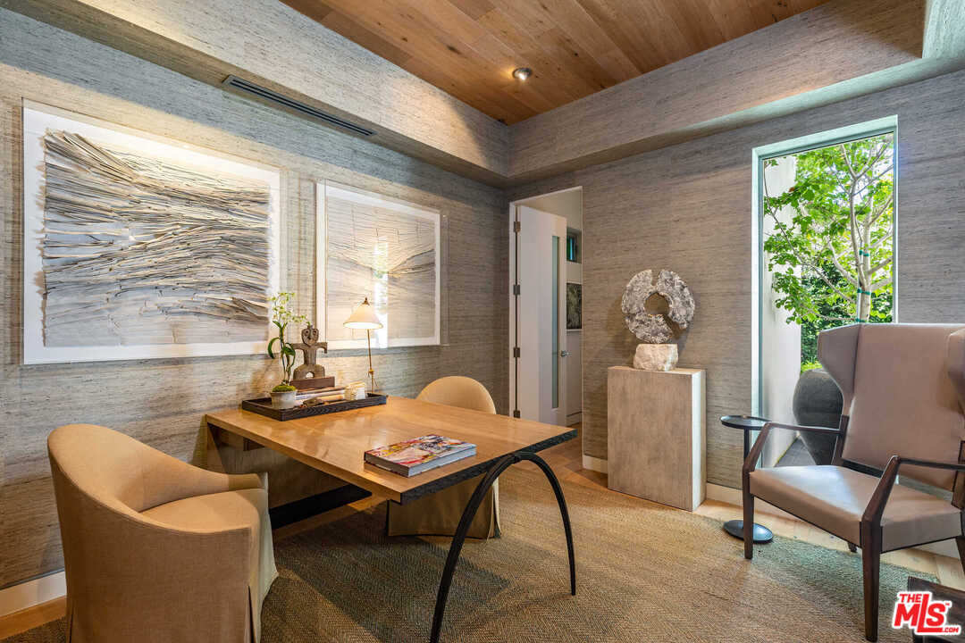 6236 Drexel Avenue Los Angeles, CA 90048 - Photo 12 of 33 a living room with furniture and a large window