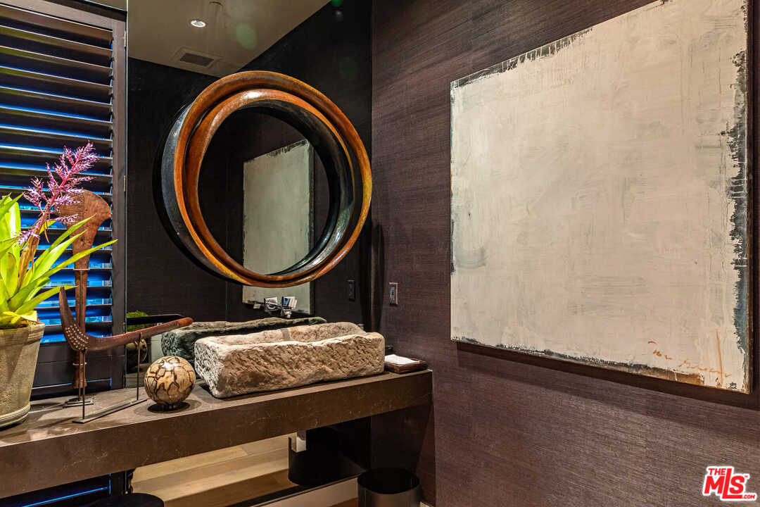 6236 Drexel Avenue Los Angeles, CA 90048 - Photo 14 of 33 a room with a wooden floor and a sink