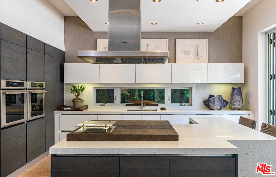 6236 Drexel Avenue Los Angeles, CA 90048 - Photo 16 of 33 a kitchen with a stove and a refrigerator