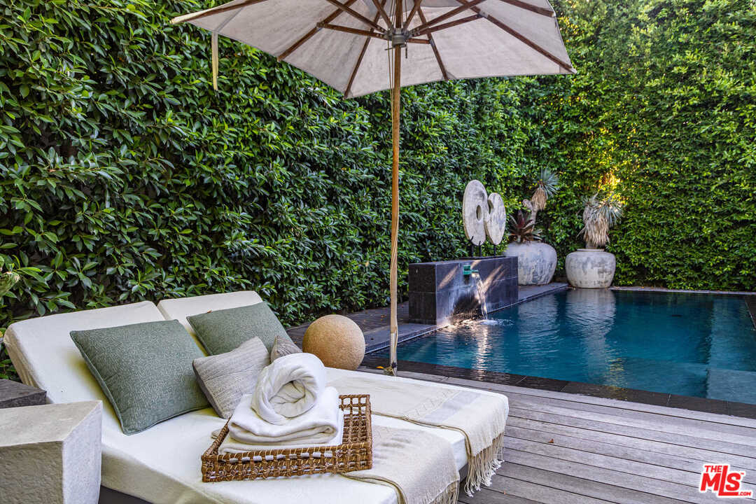 6236 Drexel Avenue Los Angeles, CA 90048 - Photo 21 of 33 a view of a patio with furniture and wooden floor
