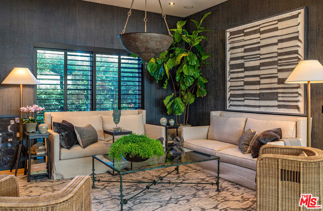 6236 Drexel Avenue Los Angeles, CA 90048 - Photo 22 of 33 a living room with furniture and a potted plant