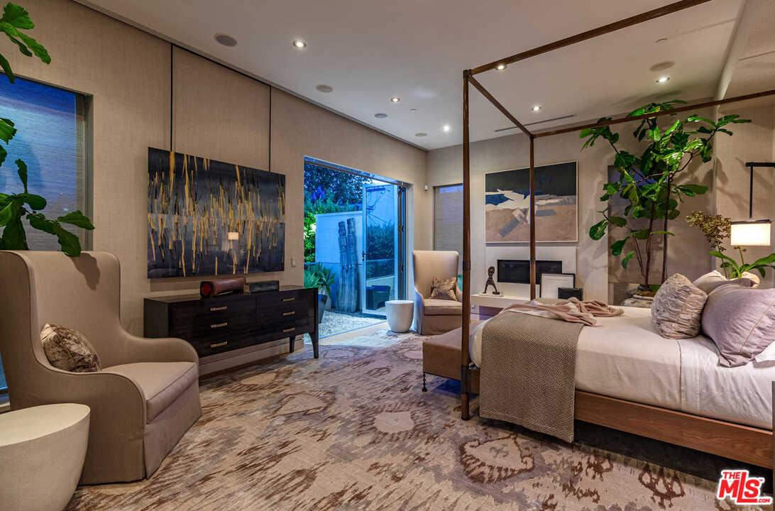 6236 Drexel Avenue Los Angeles, CA 90048 - Photo 23 of 33 a bedroom with furniture and a potted plant