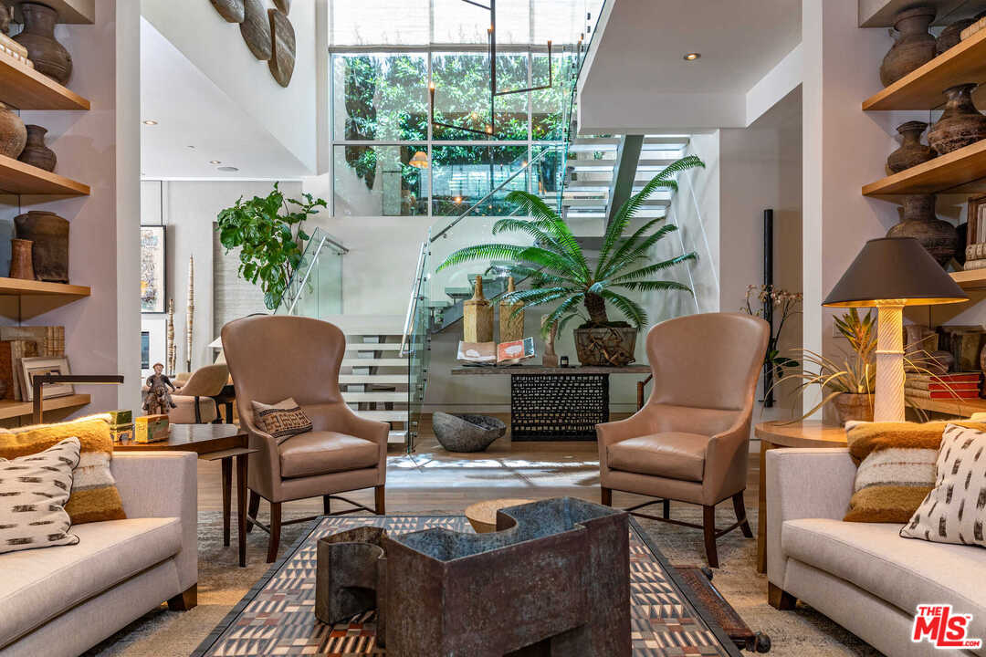 6236 Drexel Avenue Los Angeles, CA 90048 - Photo 8 of 33 a living room with furniture and a potted plant