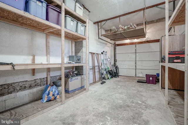 a view of an empty room with stairs