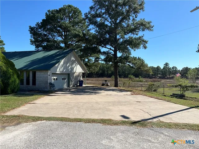 a house view with a outdoor space