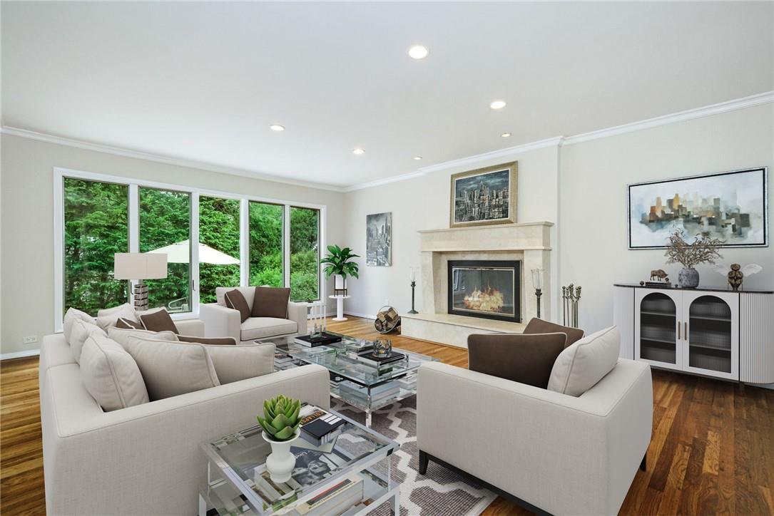 29 Mohegan Lane Rye Brook, NY 10573 - Photo 1 of 1 a living room with furniture and a fireplace