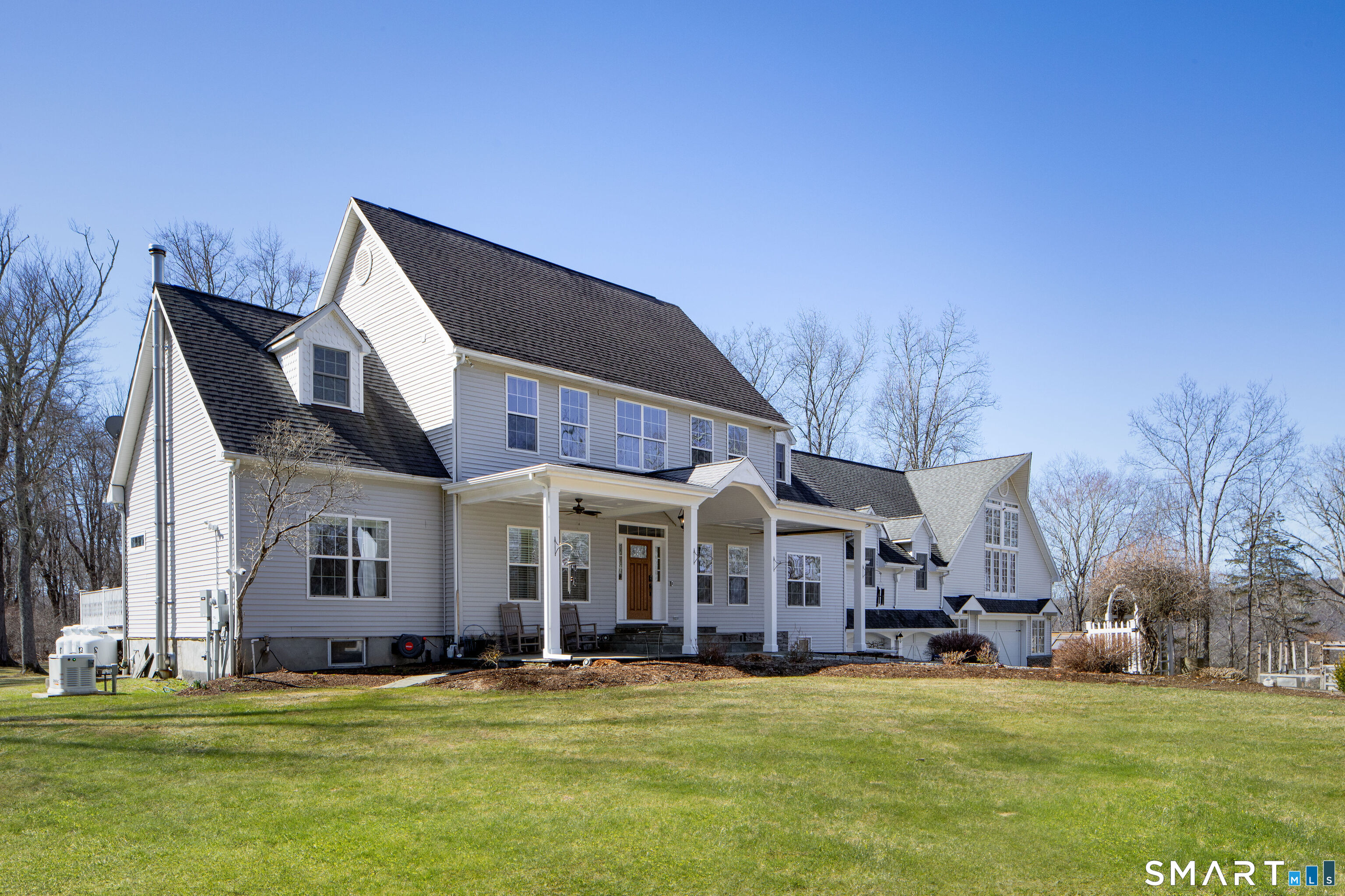 27 Smoke Ridge Drive Sherman, CT 06784 - Photo 2 of 40 Where you have beautiful yards at the front and back.
