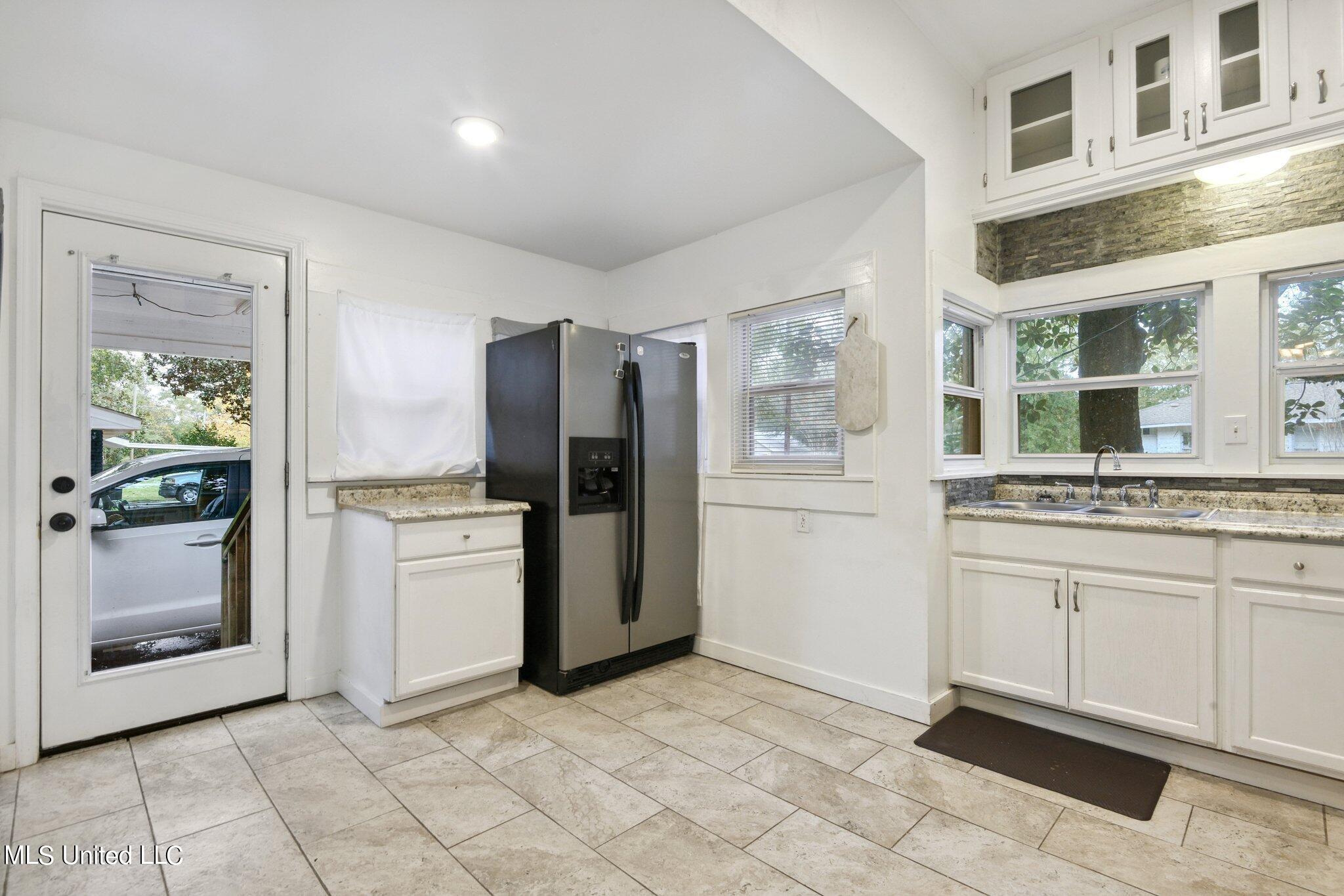 421 Pine Street Picayune, MS 39466 - Photo 11 of 15 Kitchen Leading to Carport