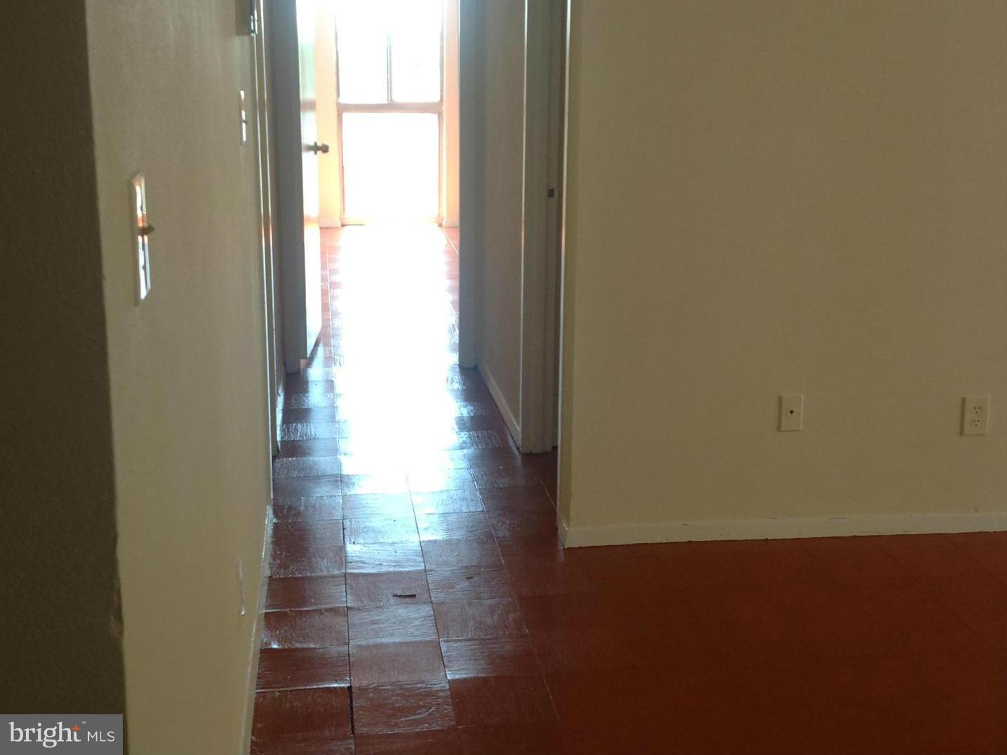 1836 Metzerott Road, Unit 1025 Adelphi, MD 20783 - Photo 13 of 30 HALL TO BEDROOM