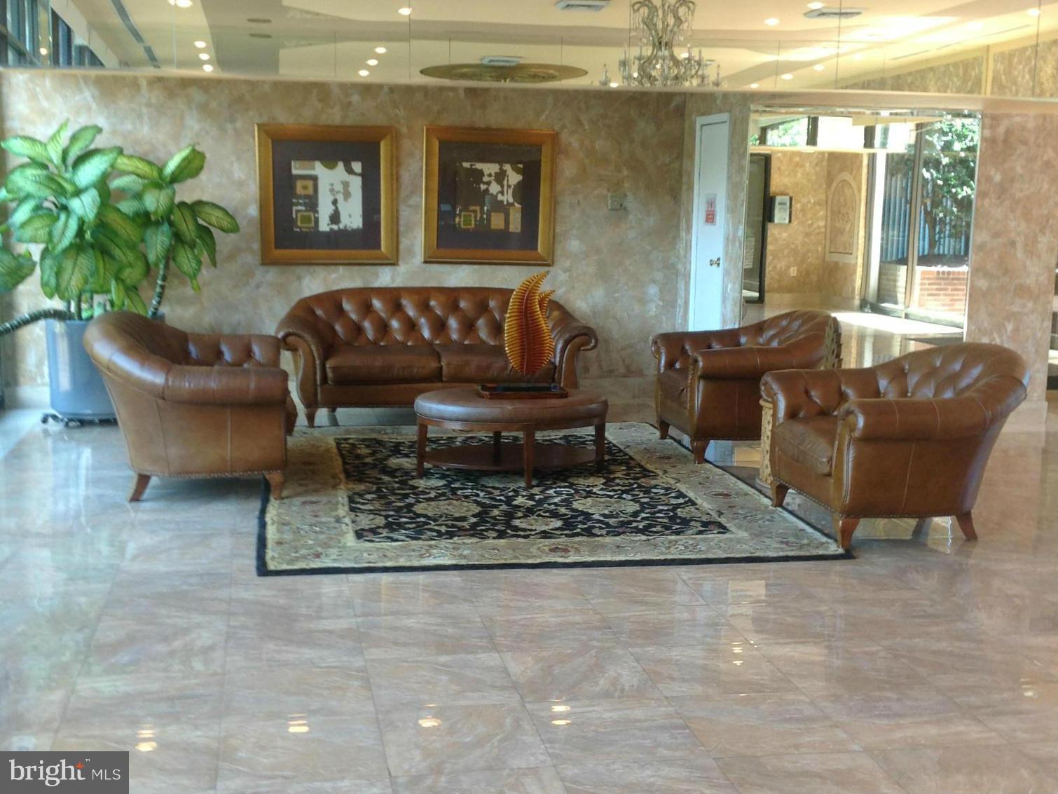 1836 Metzerott Road, Unit 1025 Adelphi, MD 20783 - Photo 5 of 30 LOBBY SITTING AREA