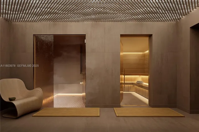 an entryway with a rug