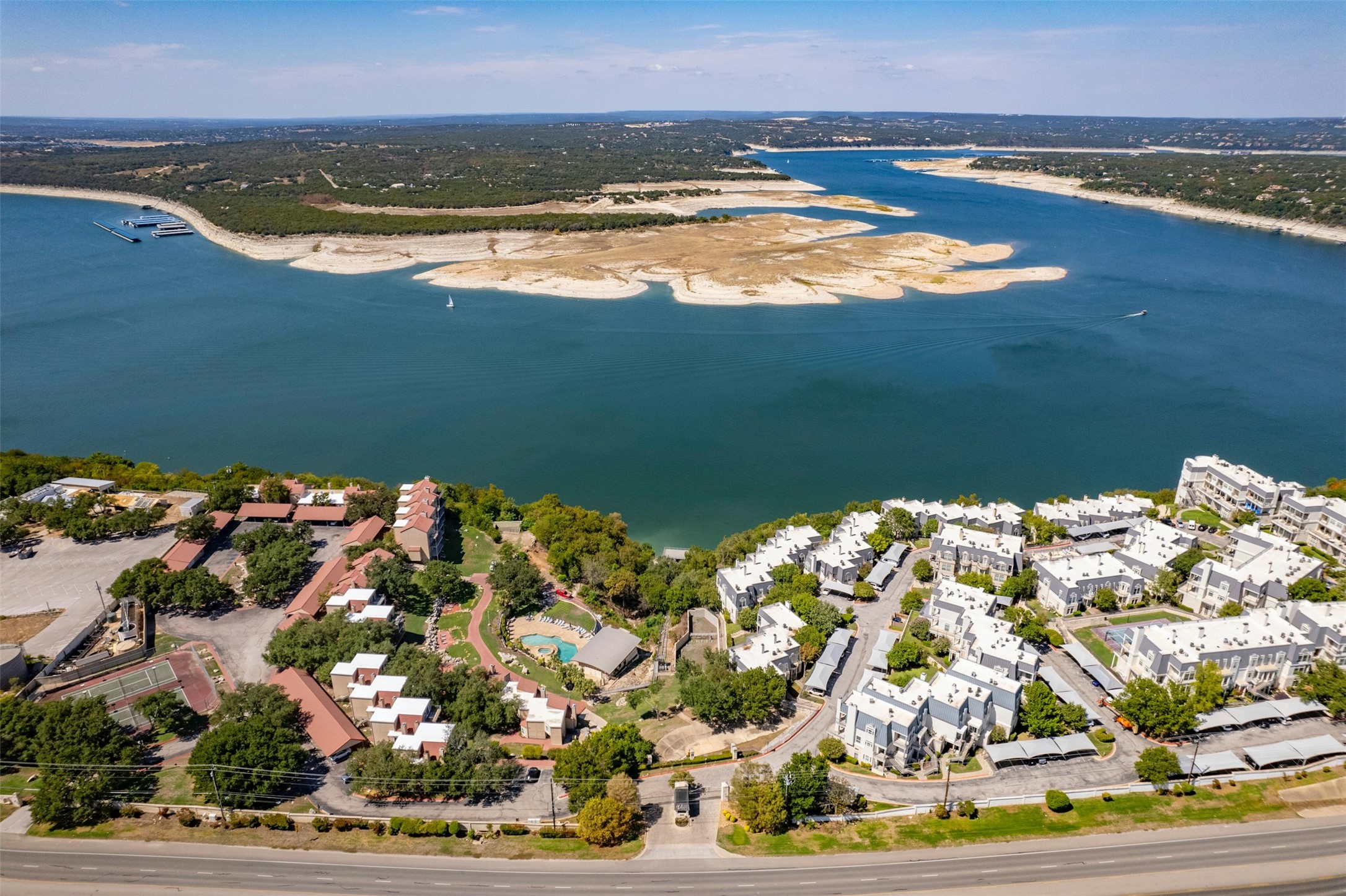 2918 Ranch To Market Road 620, Unit W219 Austin, TX 78734 - Photo 1 of 35 Soak in the sweeping aerial views of Lake Travis and the Villas on Travis community - resort-style living right on the water!