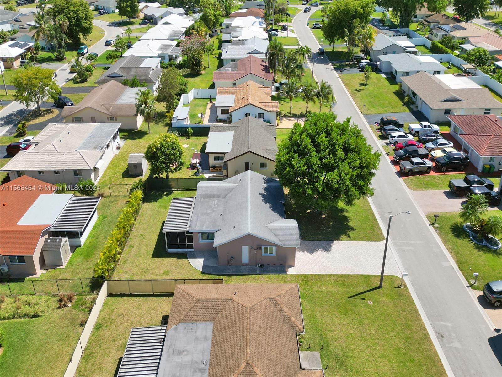 an aerial view of a house with a garden