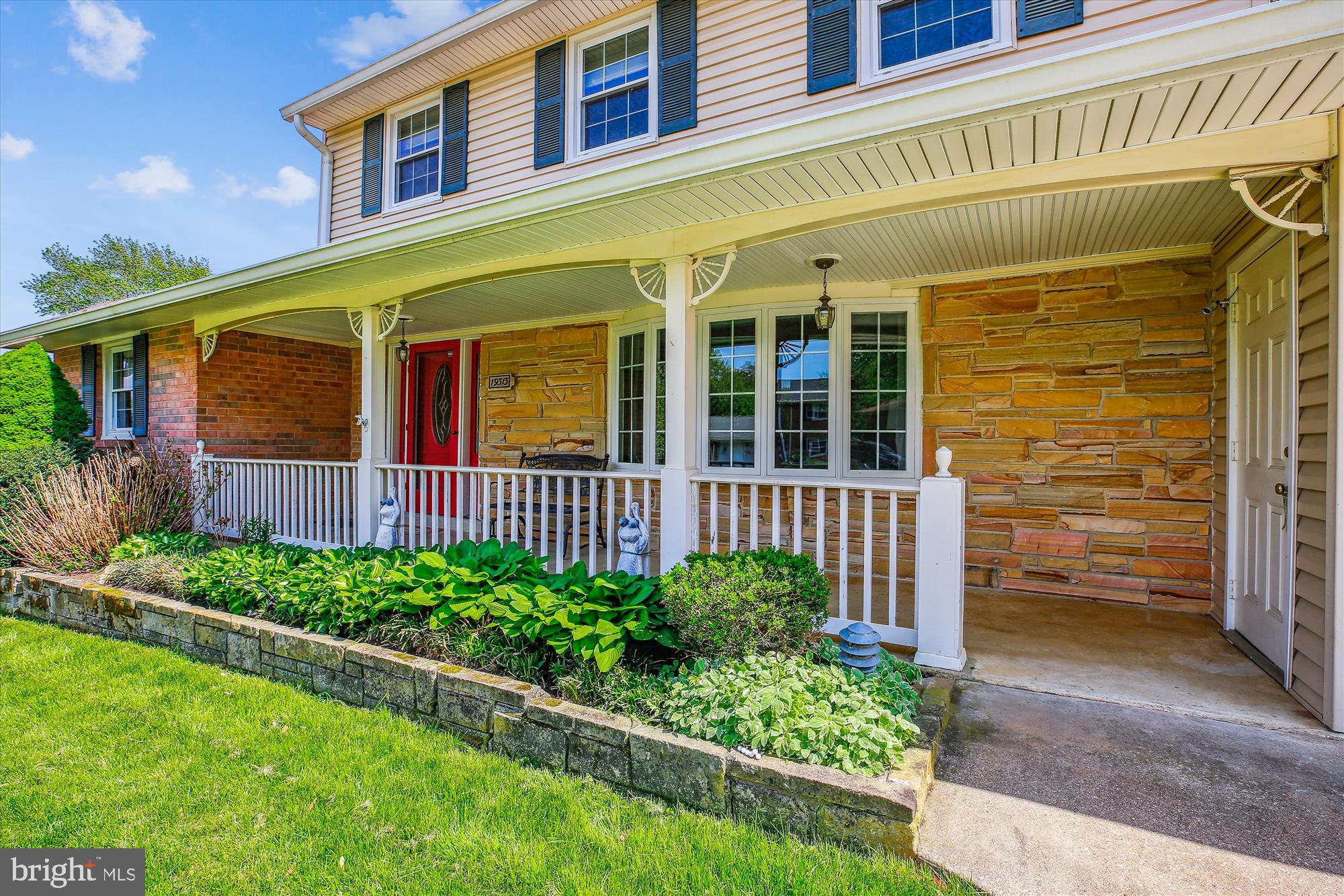 Porch Entry with Mature Landscaping