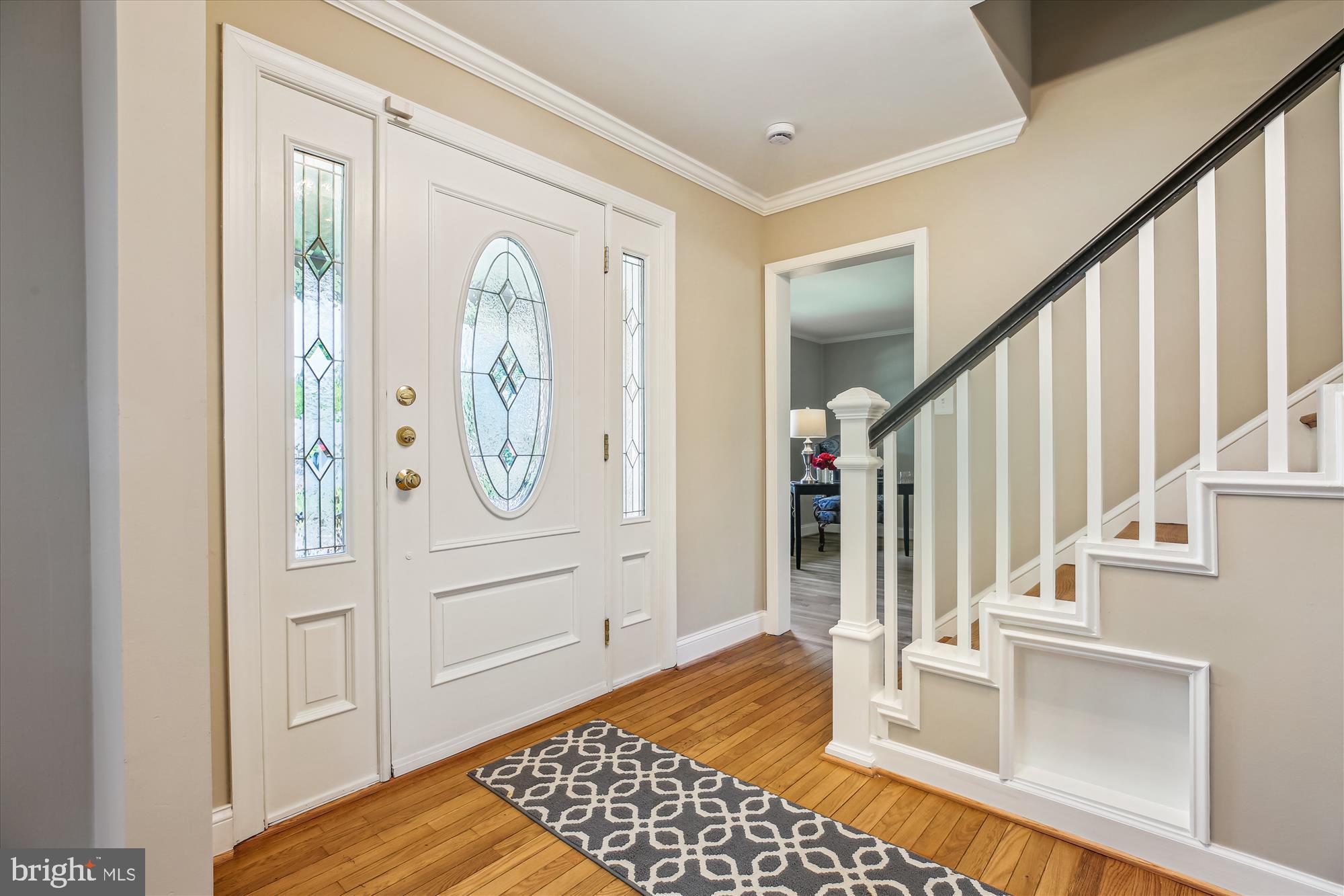 Foyer to Upstairs and Main Level Living