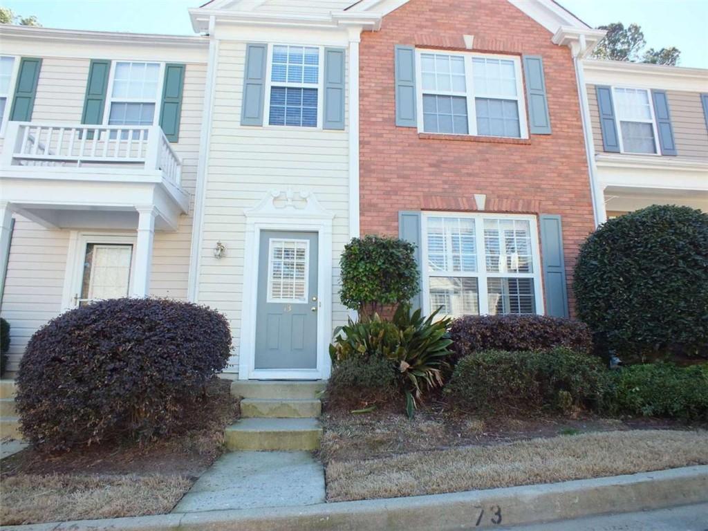 9155 Nesbit Place, Unit 73 Johns Creek, GA 30022 - Photo 1 of 12 a front view of a house