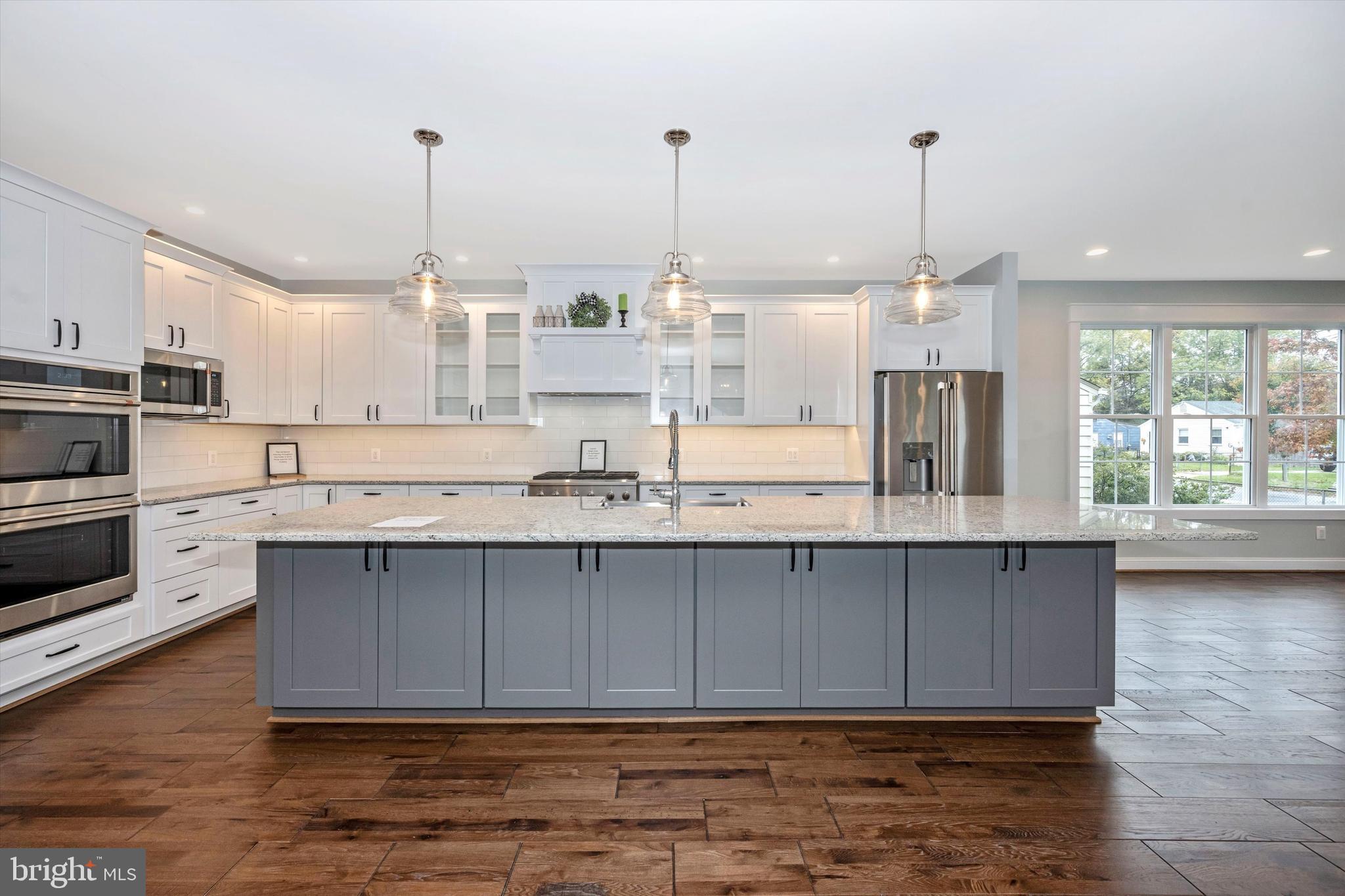 402 Pinewood Road Rockville, MD 20850 - Photo 16 of 57 Kitchen Island with Custom Lighting