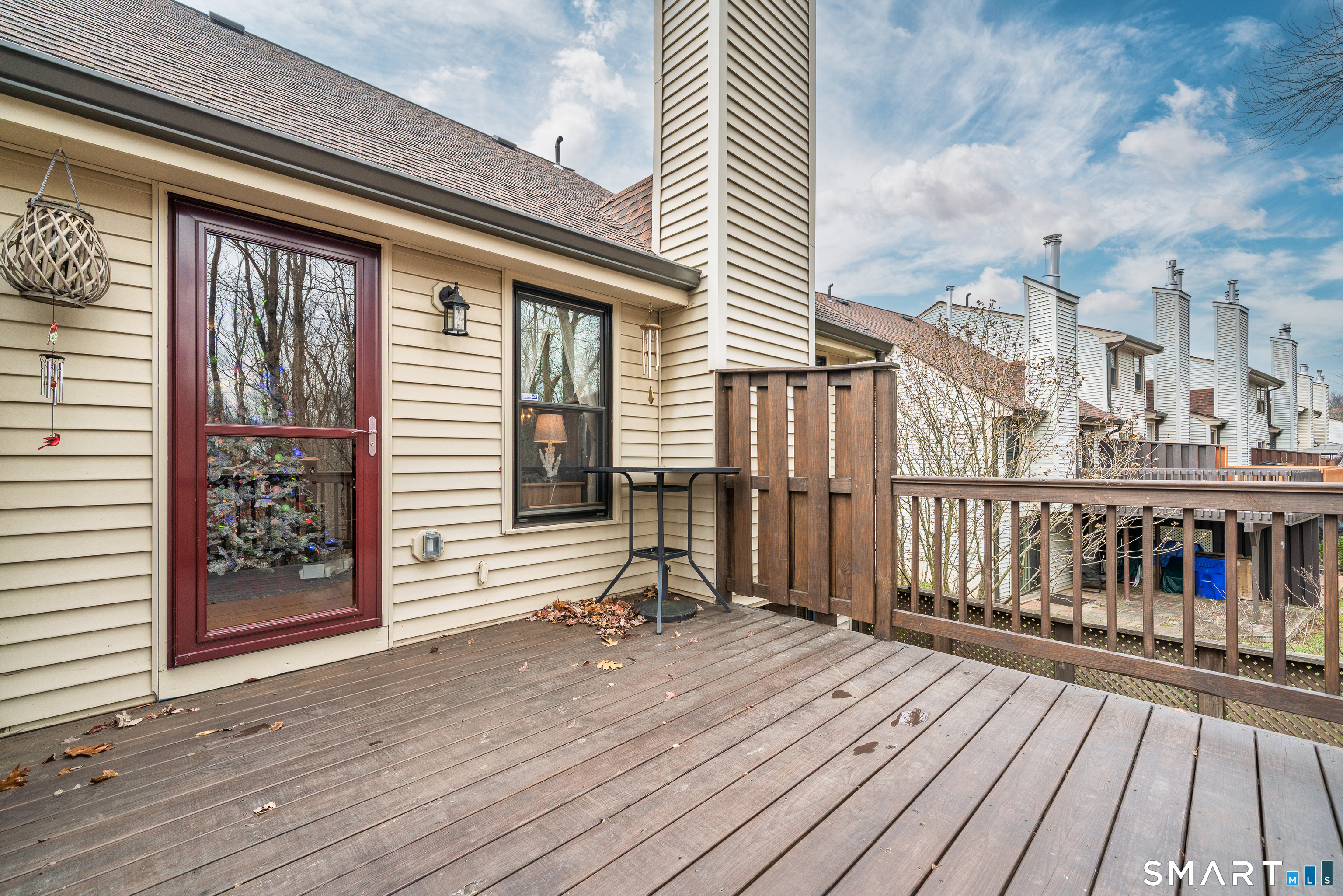 19 Tanner Crossing, Unit 19 Wethersfield, CT 06109 - Photo 33 of 40 Raised Deck overlooking yard and woods