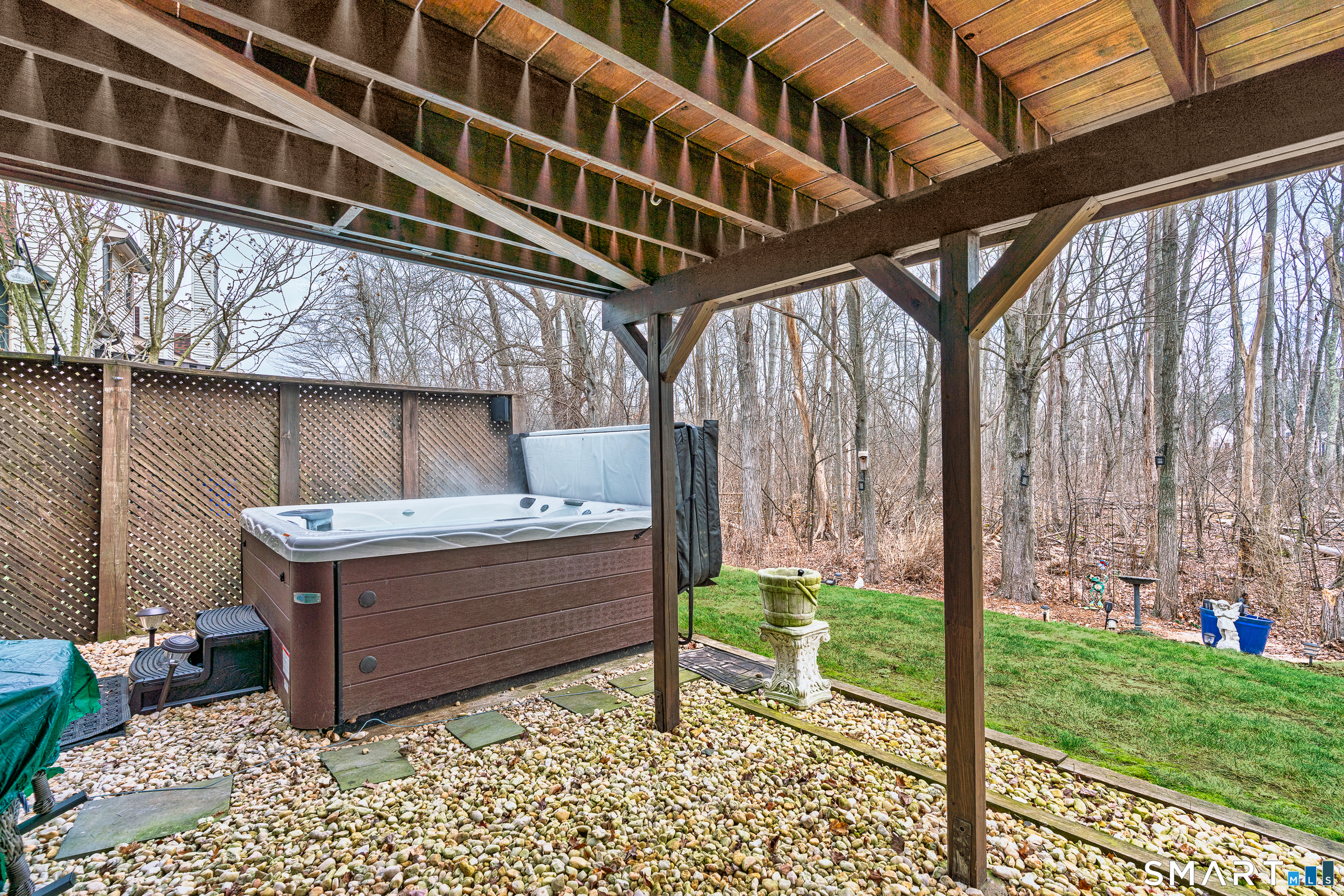 19 Tanner Crossing, Unit 19 Wethersfield, CT 06109 - Photo 36 of 40 19 Tanner - Patio Area w/Hot Tub & Surround Sound Speakers