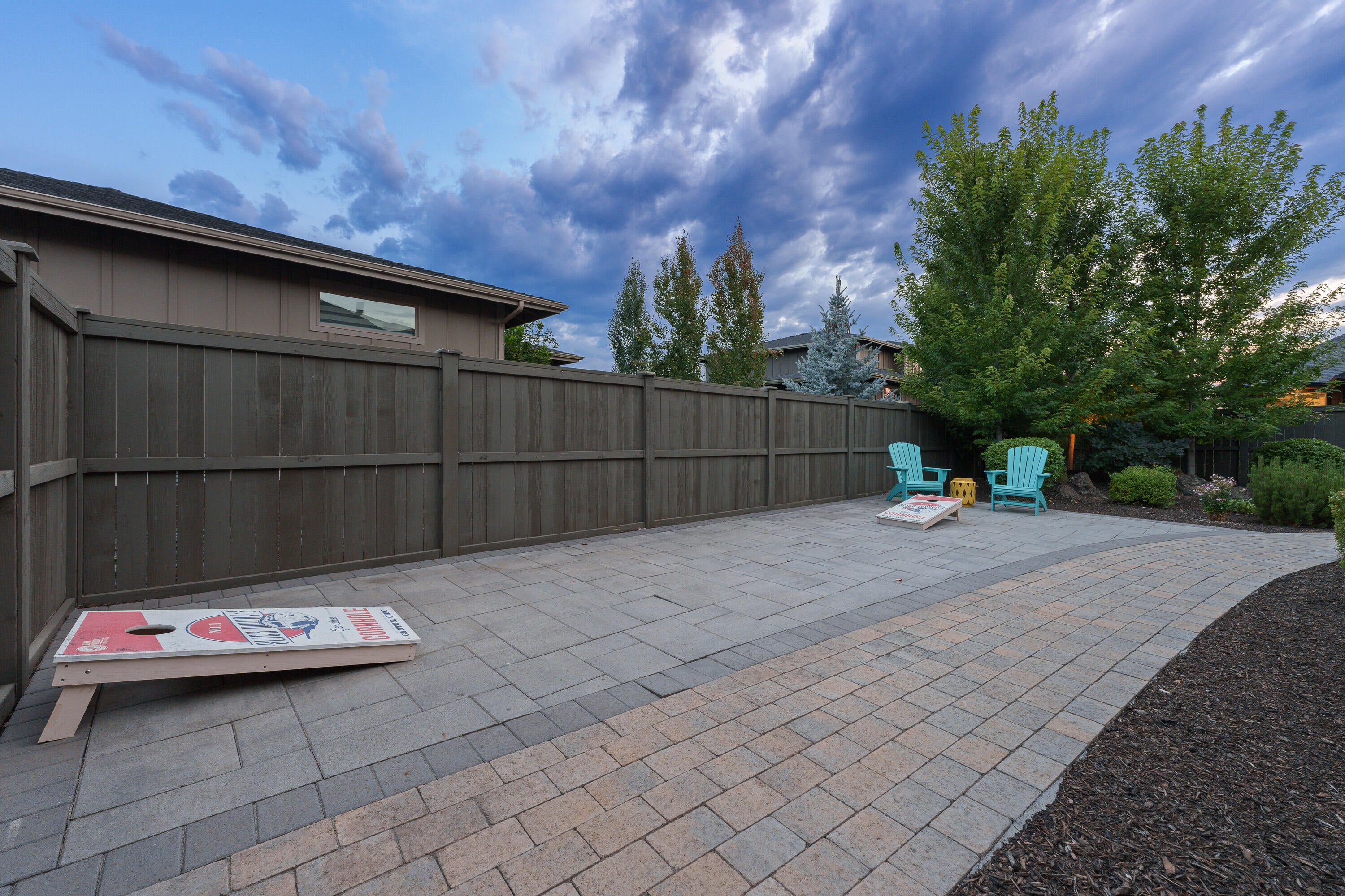 60869 Southwest Headwaters Loop Bend, OR 97702 - Photo 48 of 50 Hardscaped south side yard