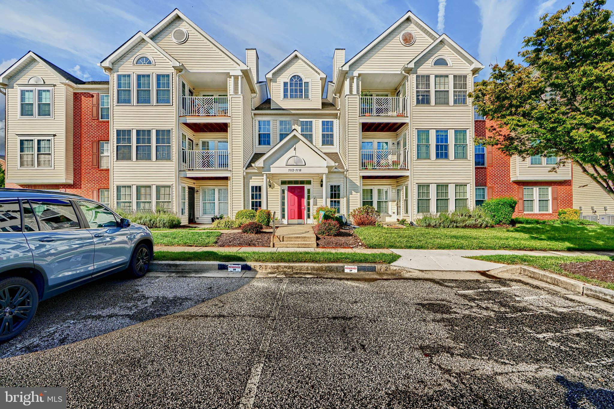 5318 Millfield Road, Unit 5318 Rosedale, MD 21237 - Photo 25 of 26 a view of multiple houses with a yard