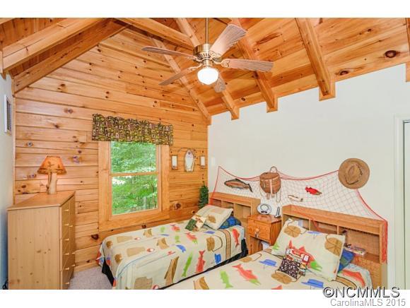 281 Tyler Terrace Rutherfordton, NC 28139 - Photo 10 of 18 a bedroom with a bed and a window