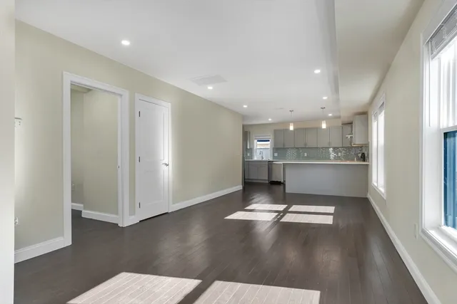 a view of kitchen with wooden floor