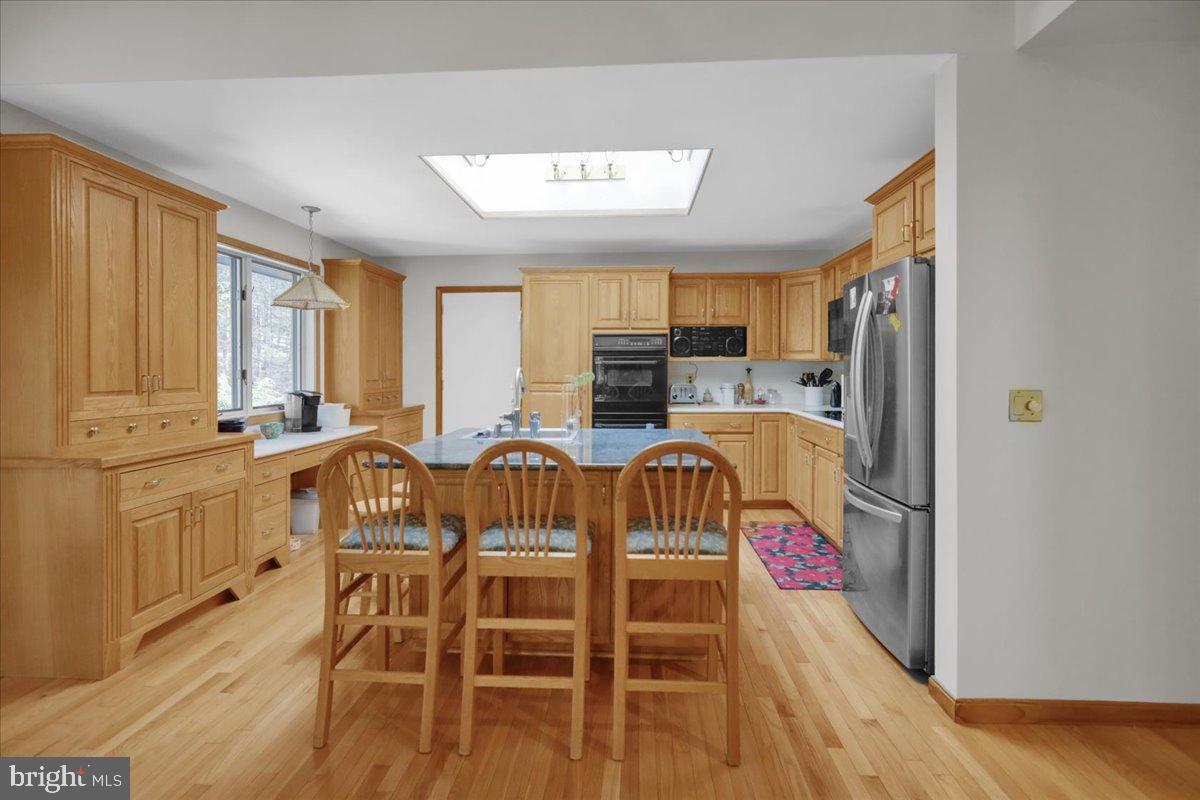 7 Hessian Boulevard Reading, PA 19607 - Photo 12 of 71 Bright and inviting kitchen with warm wood tones.